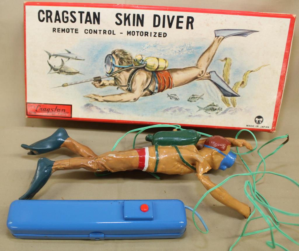Cragston battery operated skin diver in original: Cragston battery operated skin diver in original box, arm & legs melted/damaged