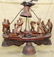 Black Forest carved hanging light with 8 carved