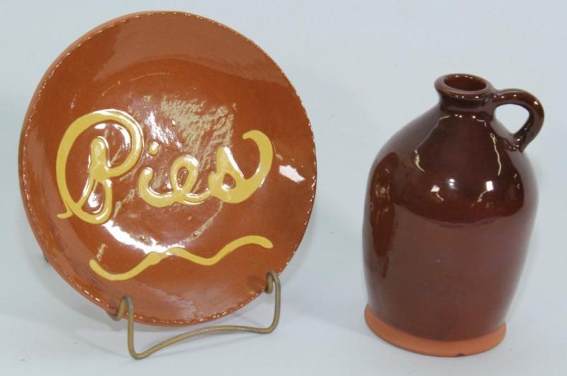 (2) pcs - 7" slipware "Pies" plate "Breininger: (2) pcs - 7" slipware "Pies" plate "Breininger Pottery Aug 13, 2001 the weather was cloudy" & glazed redware jug 6" high made & signed by "Joel B. Leh 3/17/67 snow cold 31 degrees". Joel is a descenda