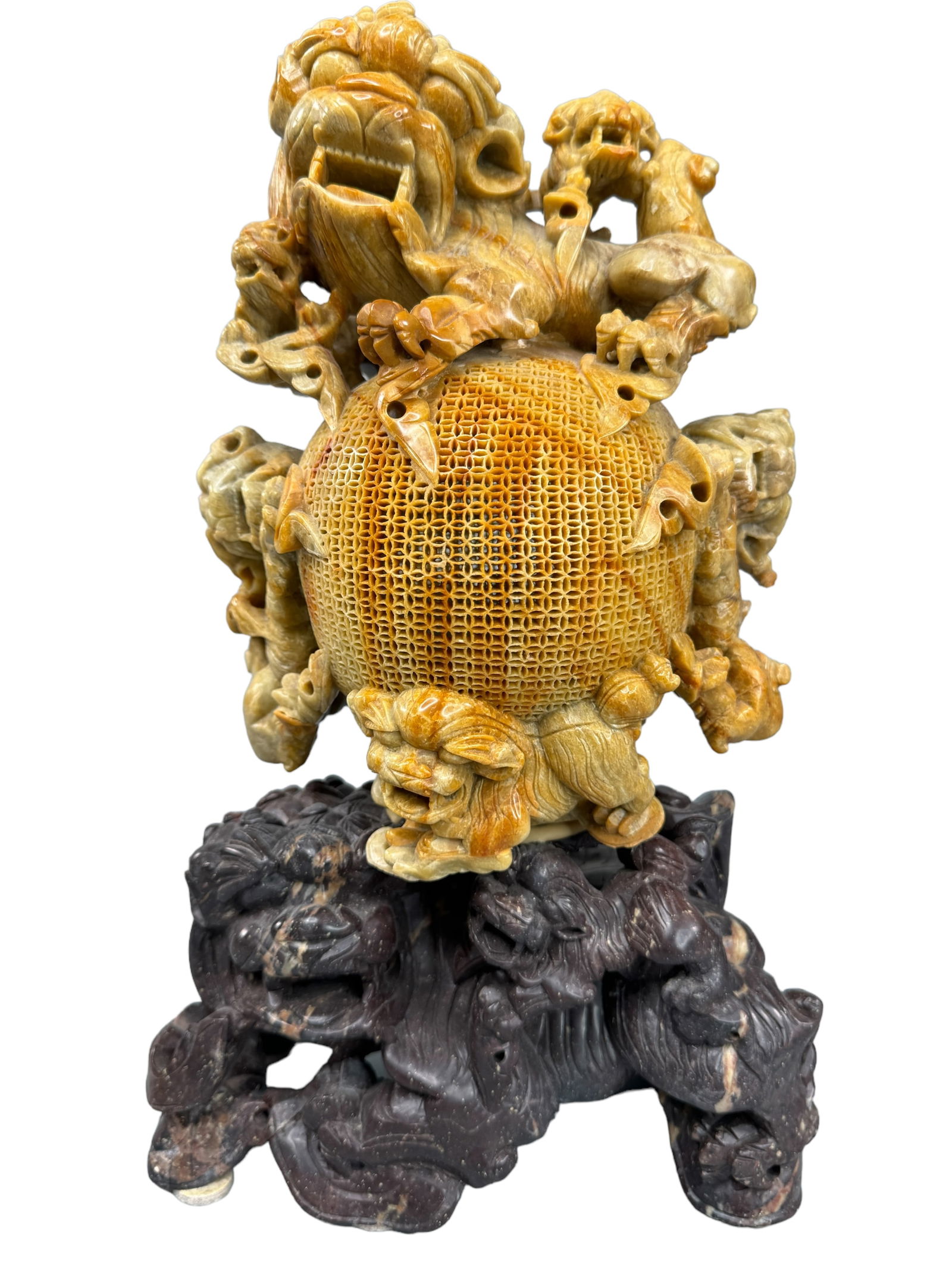 Chinese Hand Carved Soapstone 9 Foo Dog Statue: 9 Foo dog/lion figures in this hand carved Shoushan / soapstone statue. Expertly carved reticulated center ball and highly detailed Foo dogs/lions. Color variations in the stone depict the top and the