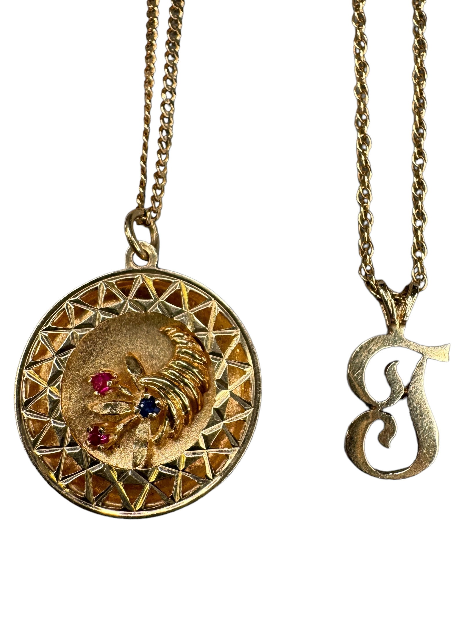 14k Sapphire & 14k Monogram Necklaces: 14k single link 17 inch chain with a 14k marked reticulated shadow round pendant depicting a cornucopia with a 2mm tested round cut sapphire and two 2mm pink stones. Second necklace is a 14k double li