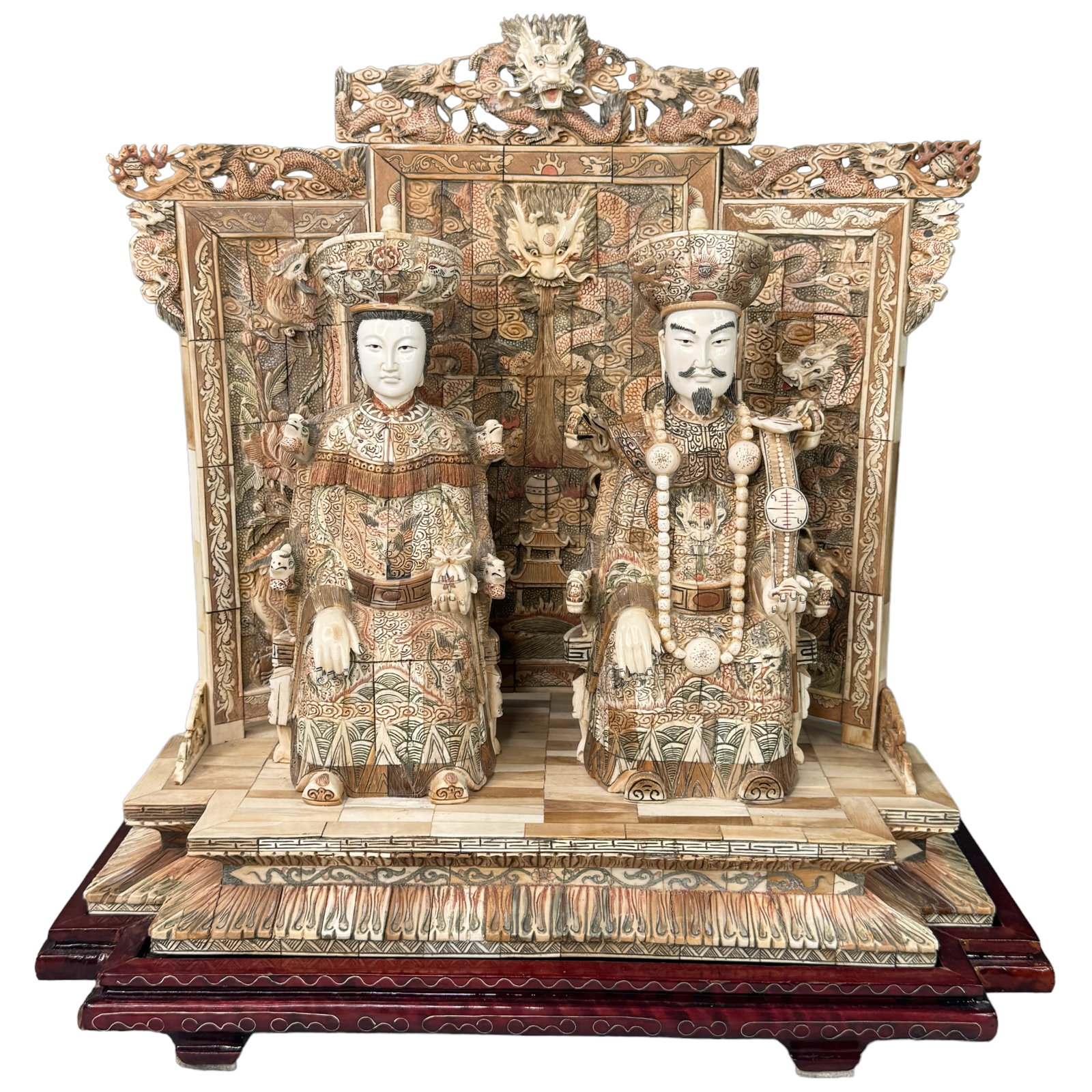 Mammoth Tusk, Bone Carved Panel Emperor & Empress: Highly detailed panel pieced carved mammoth tusk, bone and white hard natural material piece depicting an emperor and empress with a intricate back panel. Fine line etchings and coloration add to the 