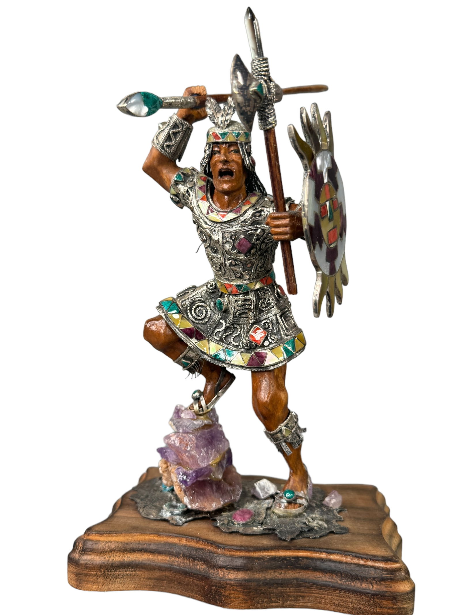 Simoni Peruvian Wood, 950 Silver, Genuine Stone: Simoni Collection Cusco Peru Carved cedar Incan warrior dressed in 950 Peruvian silver and adorned with mother of pearl, spondilus, and stones such as malachite, crysocolla, sodalite and amethyst. Mos