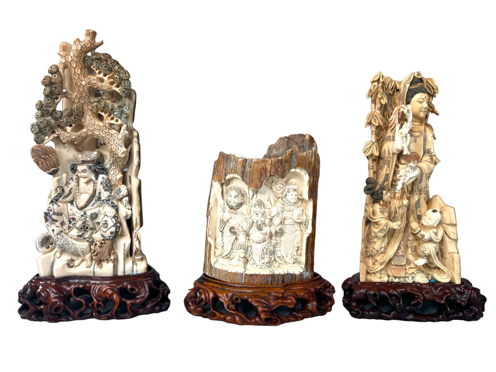 3 Intricately Carved Mammoth Tusk Fragments: Three unique and expertly carved mammoth tusk fragments. One depicts an emperor with servants, one depicts a man with a jug of wine and a pig, and one is of Quan Yin. All three have finely etched and 
