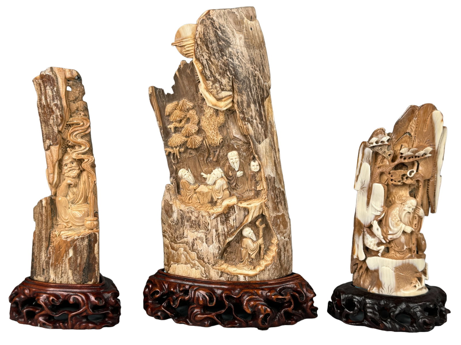 3 Beautifully Carved Mammoth Tusk Sections: Three intricately carved ancient mammoth tusk sections. Two have carved scenes on the front and back. All three have superb detail in the faces of the men down to the textures in clothing. They range 