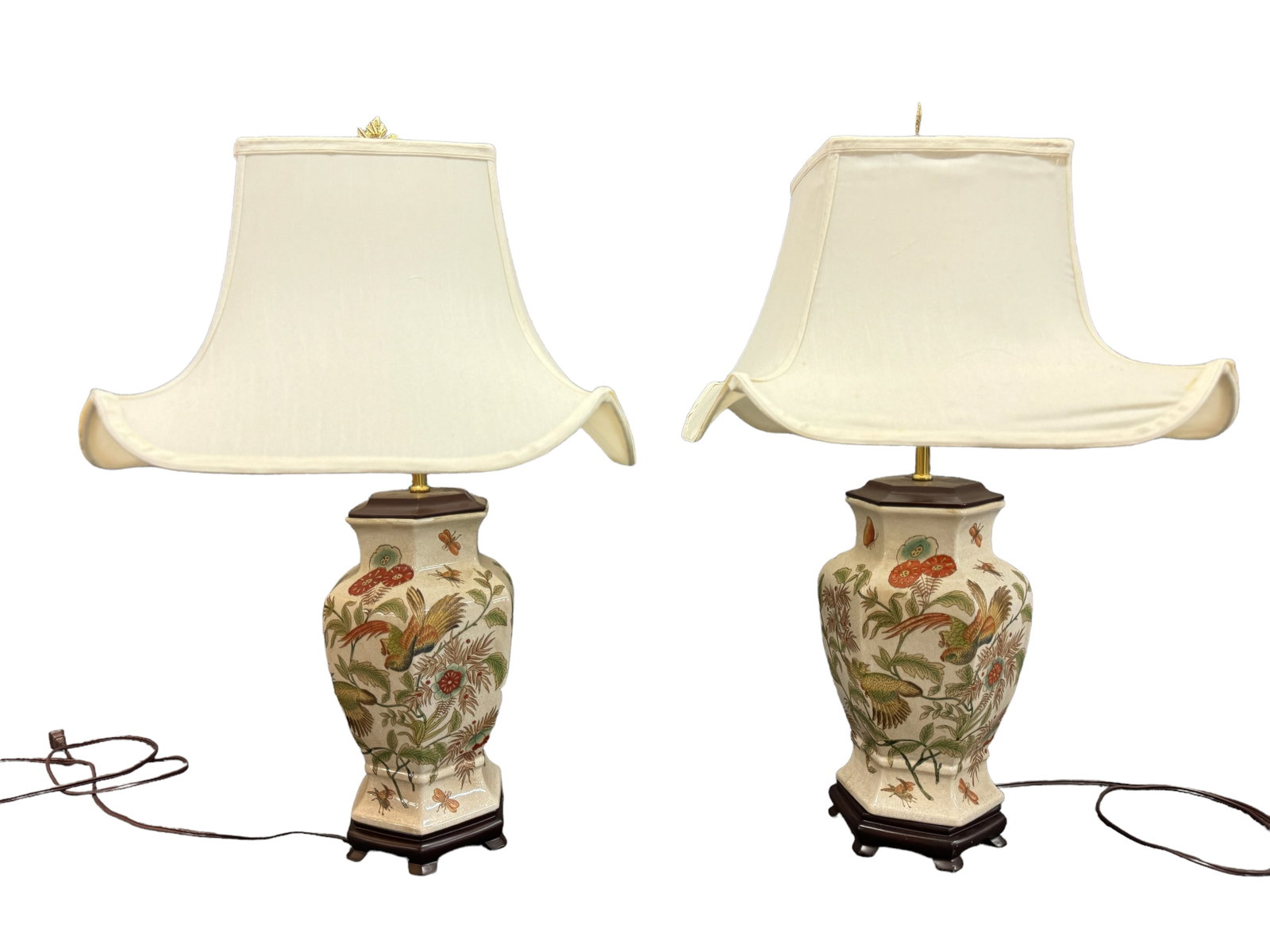 2 Vintage Hand Painted Asian Ceramic Lamps: Hand painted Asian detailed ceramic lamps with appropriate pagoda structured shades. Depictions of birds, insects and florals. Both are untested and are 30 inches tall to finial. *** This item require