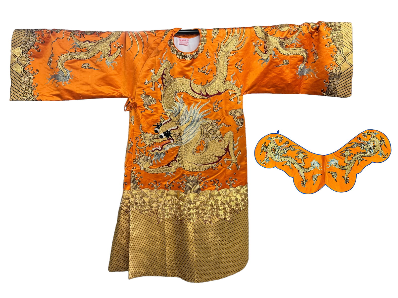AMAZING Gold Embroidered Emperors Robe: A simply stunning orange emperors style vintage robe with hand detailed gold embroidery depicting dragons. Detached collar. Measures 59 inches in length with a 76 inch span across the arms. Comes with