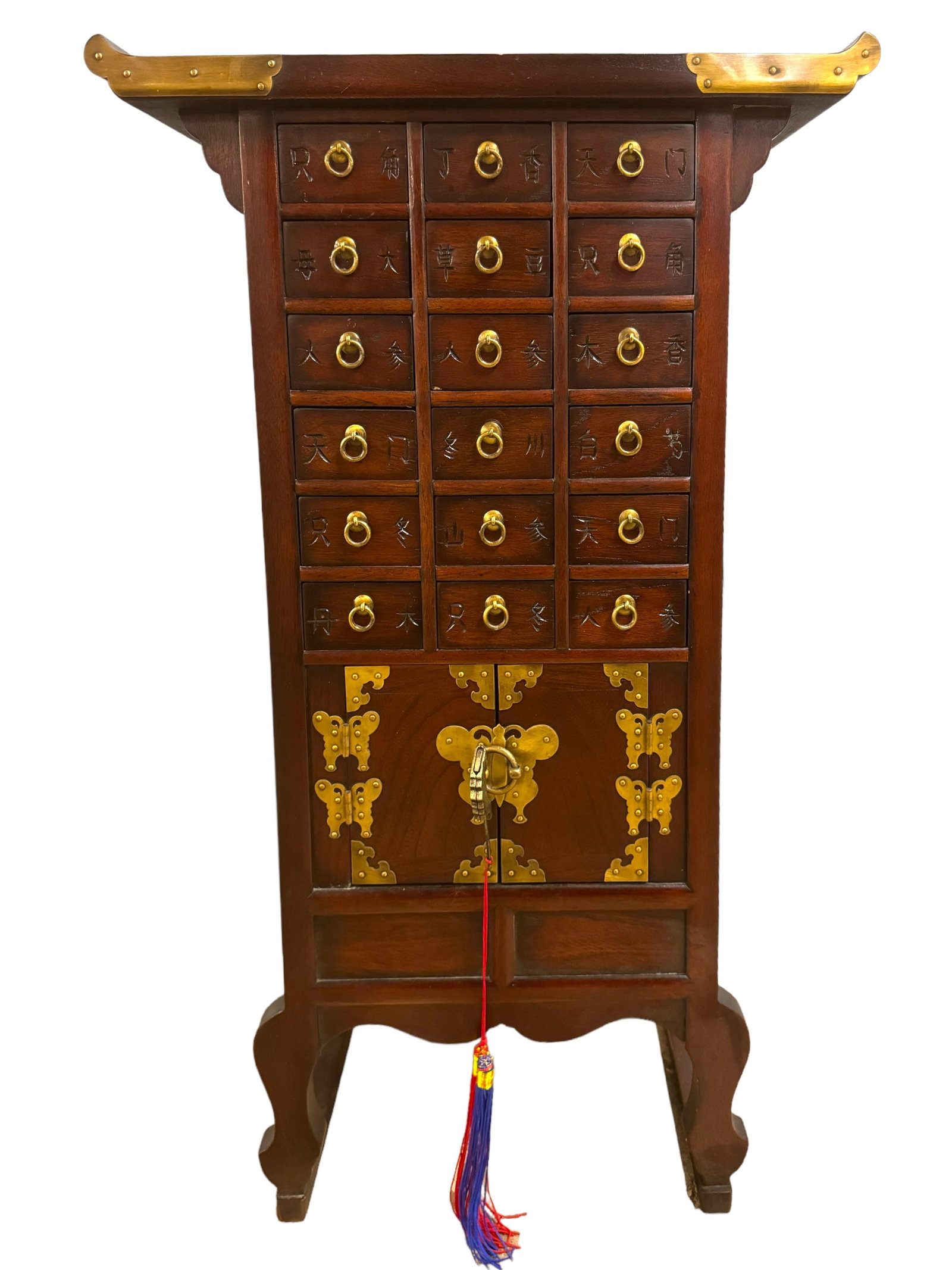 Asian Wood Jewelry Cabinet W/ Fish Lock: dark wood Asian style jewelry chest cabinet. On legs with 18 small drawers that have been carved with Asian characters. Door on the bottom with a brass signature Asian fish lock. Key included. Brass a