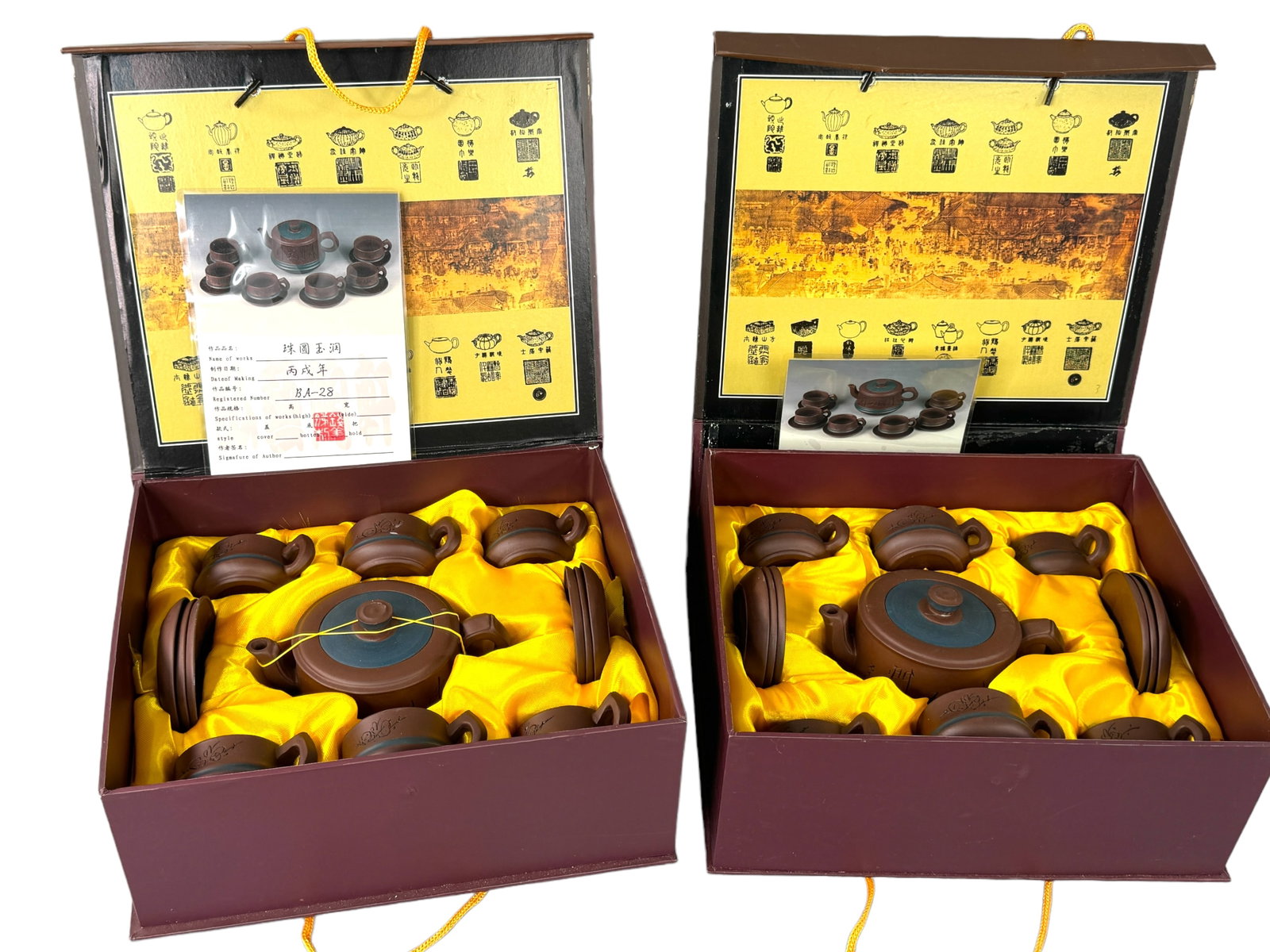 2 Boxed Yixing Purple Sand Pottery Tea Sets: Both sets are new in the original boxes from purchase. Each set includes a teapot, 6 cups and 6 saucers. The title translates to PEARLY AND ROUND.