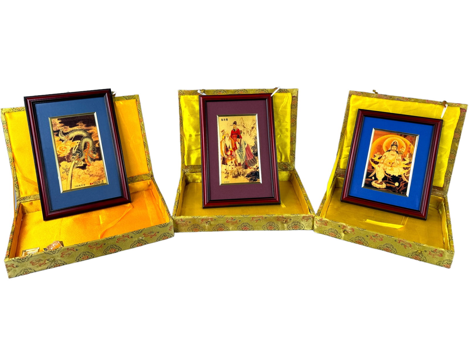 3 Boxed 24k Gold Leaf Lithographs, Framed: 3 framed 24k gold leaf lithographs. One is a depiction of a dragon measuring 11.75 x 7.75 inches, one translates to BODHISATTVA and is 9.75 x 7.75 inches, and the third one is FU, LU & SHOU measuring 