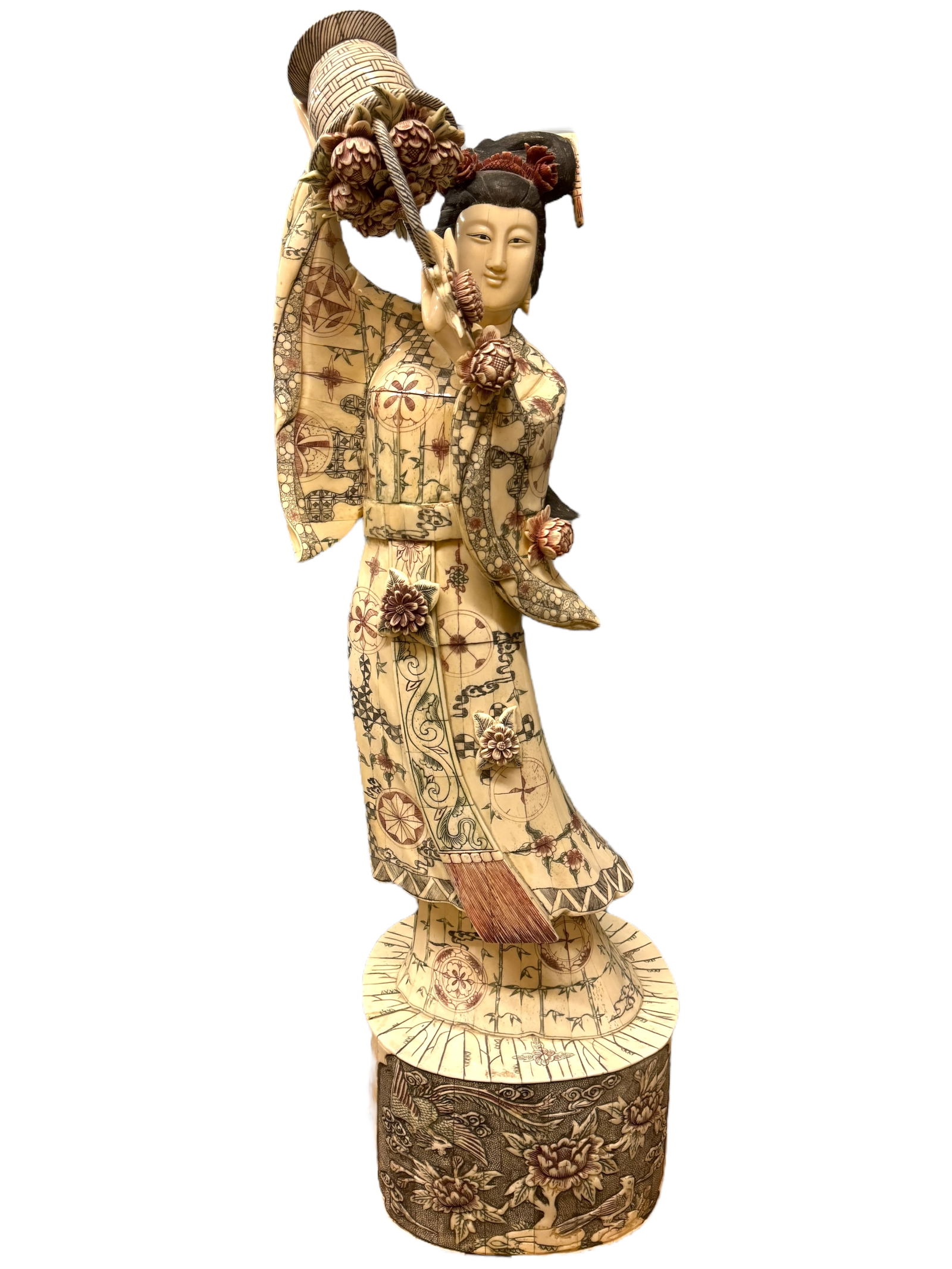 Large Carved Asian Tessellated Bone Panel Woman: Expertly carved bone panels into a tessellated large statue of an Asian woman with a flower basket. Beautiful colored and plain etching among the carved areas give textures and detail. She stands 43 i