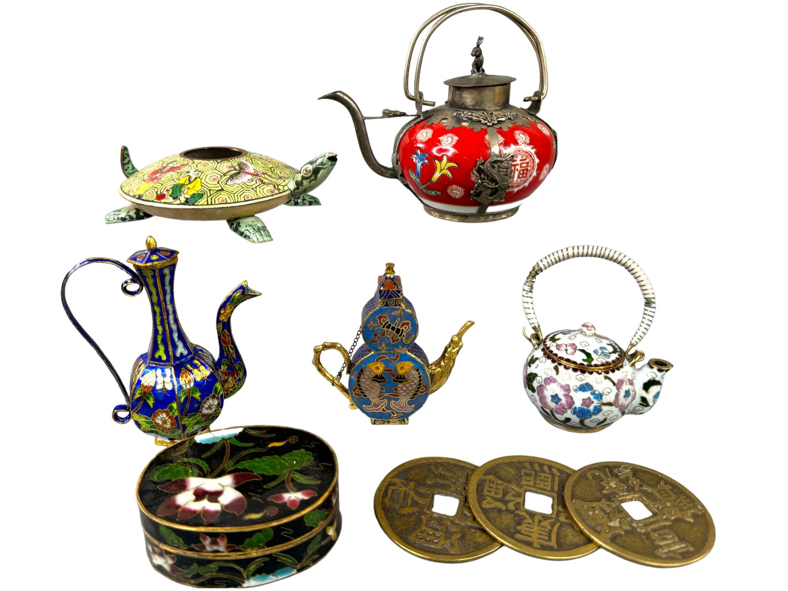 Tibetan Rabbit Tea pot, Enamel Wares, Bronze Coins: Antique Tibetan red porcelain mini teapot with silver toned rabbit finial, spout, handles and wrap form. Intricate metal work of butterflies, a frog and dragon. Stands 4 inches tall. Character marked 