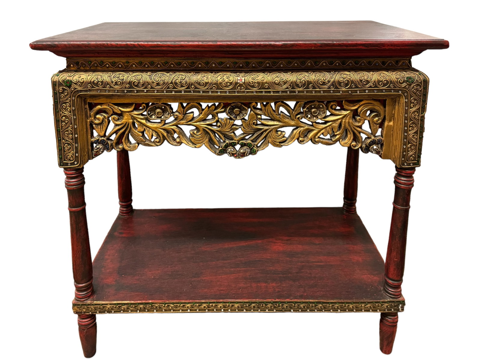 Gorgeous Vintage Thai Style Side Table: Thai style decorated wooden table with red/black lacquered top and under shelf, intricately carved face with applied colored glass and mirror pieces and golden painted applied moriage style textures. 