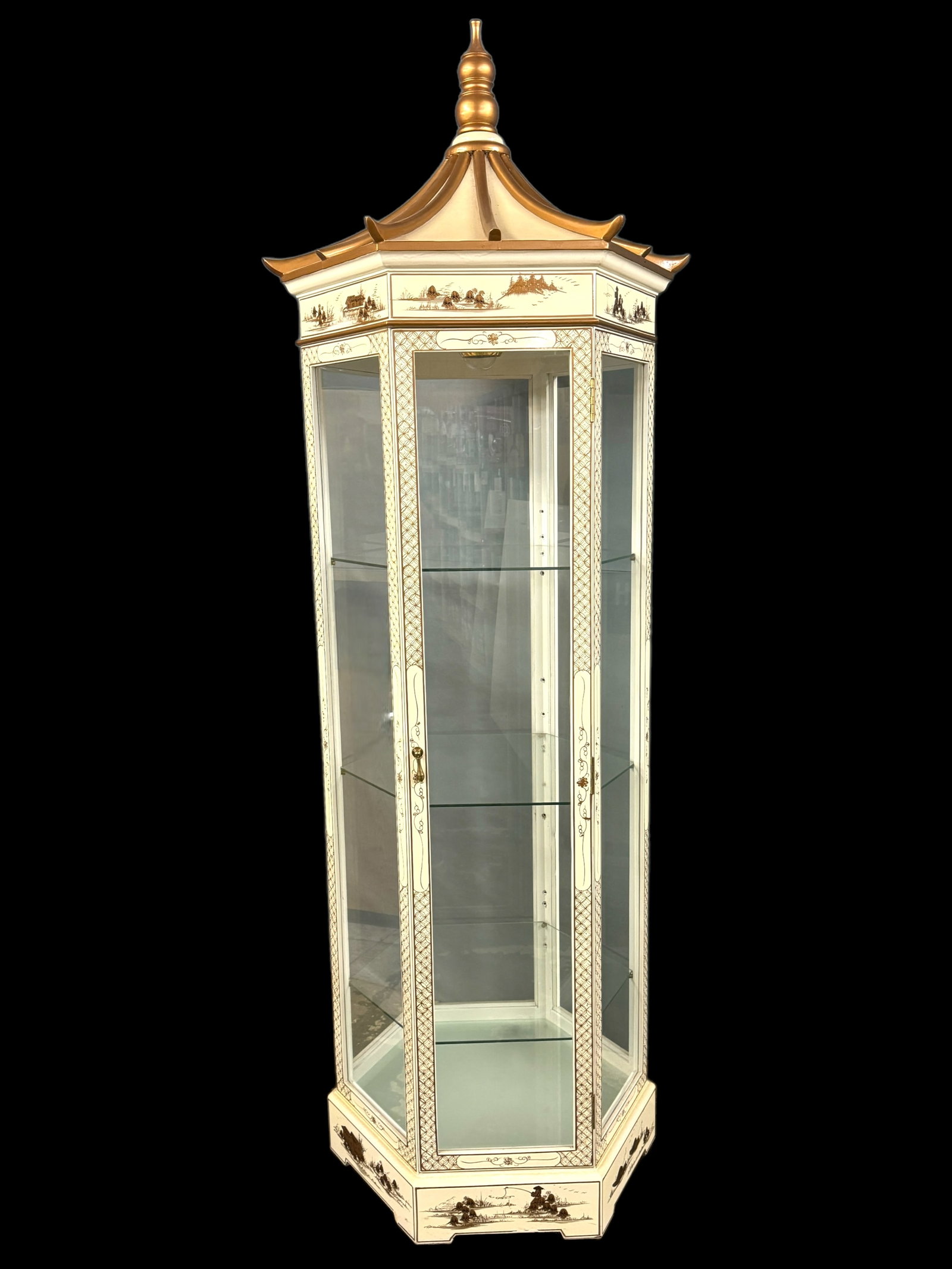 GORGEOUS Chinoiserie Hexagonal Lighted Curio: Vintage Chinoiserie style/ Asian hexagonal white lacquered curio cabinet. Golden painted Asian design and patterning, pagoda style top. all six sides have glass panels and inside holds three glass she