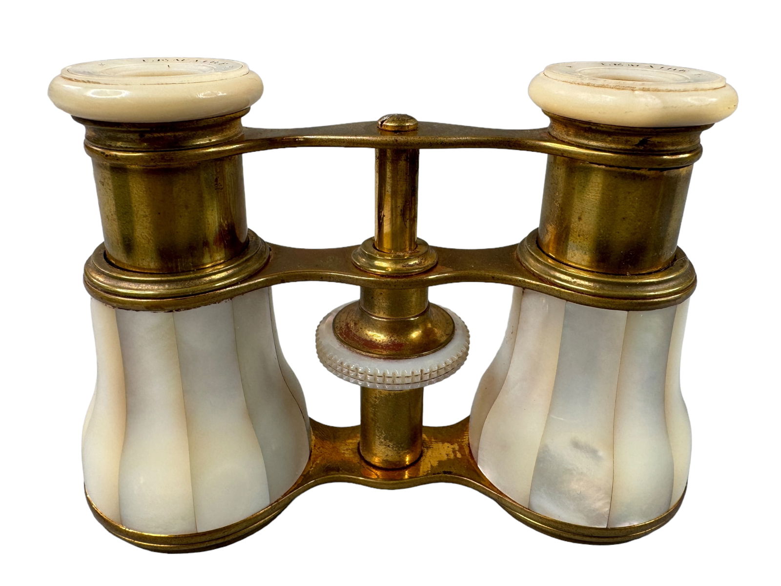 Antique Lemaire Paris MOP Opera Glasses: Beautiful antique Parisian mother of pearl opera glasses by Lemaire. brass framing with carved MOP eye cover and center dial. Paneled MOP around main lens housings. Extends from 2 to 2.75 inches tall.