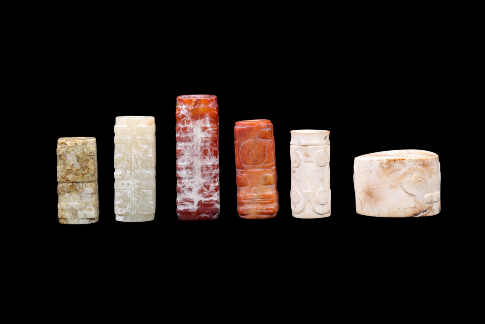 A Group of Six Calcified & Reddish Jade Cong-Style Beads, Liangzhu, Circa 3300?C2300 C BC Pr.: Size:(Height3.5cm Height4cm Height4.8cm Height3.5cm Height3.2cm Height2.4cm ) Shipping:EU\HK\USA Ondoor shipping estimation:75EUR Condition:(Good Condition, No Repairment Checked by UV&Strong Light, A