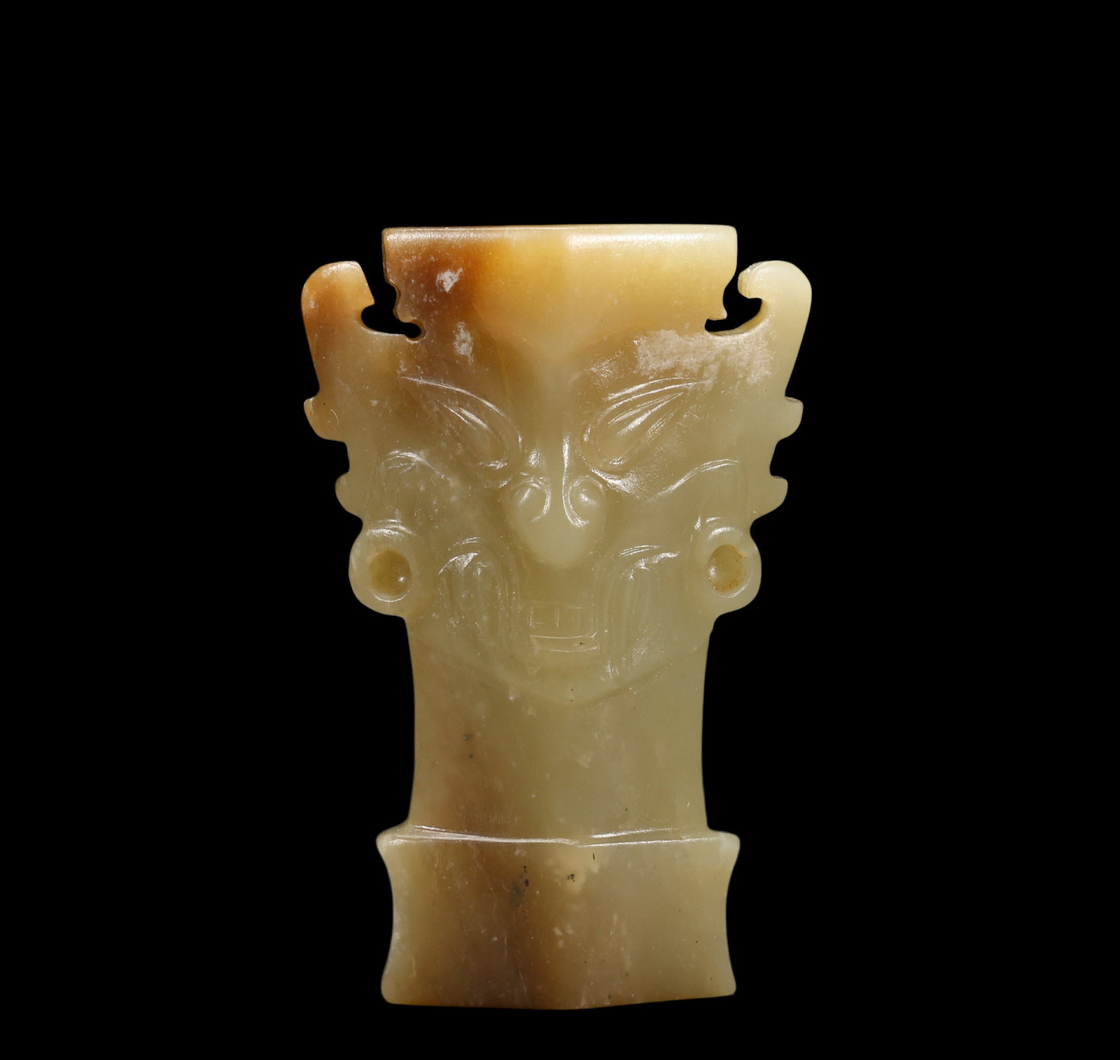 A Pale Celadon Jade Human Mask Pendant, Shang, Circa 13th?C11th C BC Pr.: Size:(Height7cm,Width4.5cm) Shipping:EU\HK\USA Ondoor shipping estimation:75EUR Terms:(It is the Buyer's responsibility to inspect each lot and deem their own opinions on Condition, Description, Prove