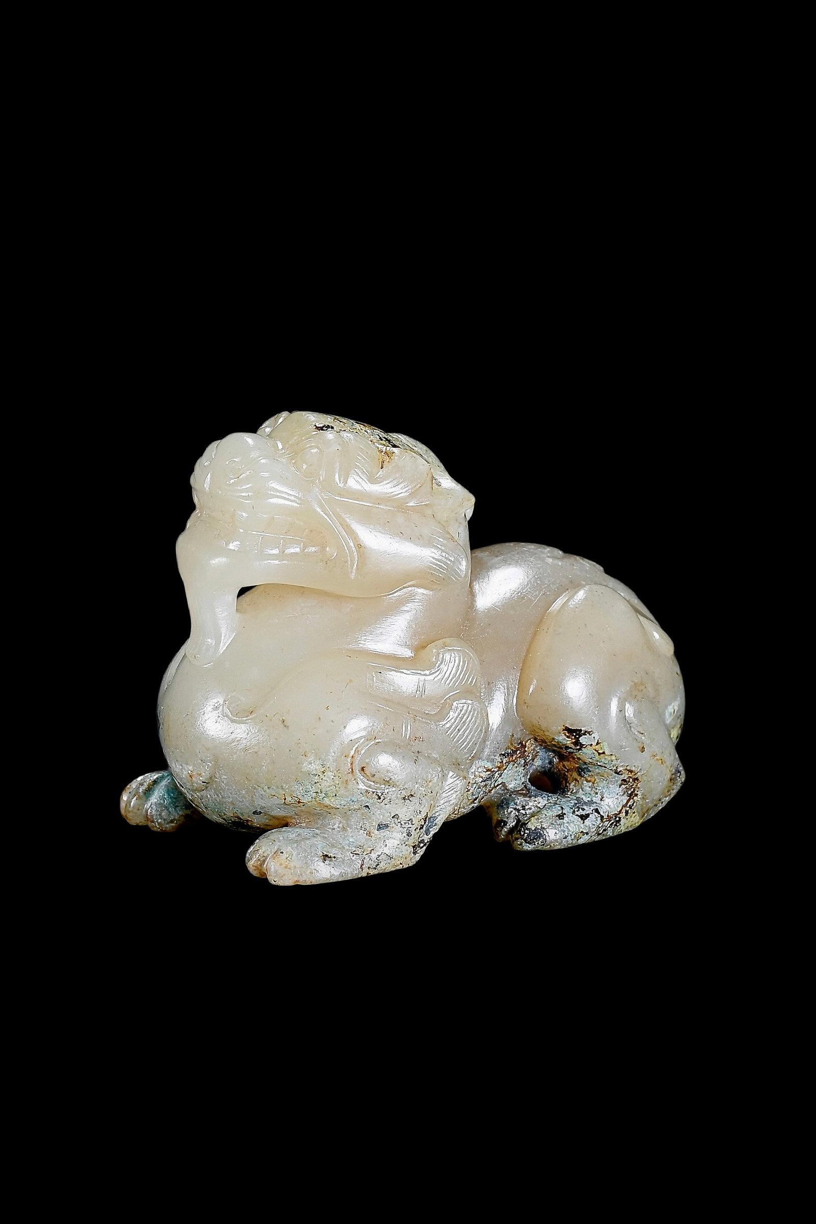 A Pale Celadon Jade Mythical Beast Carving, Han, Circa 2nd C BC?C2nd C AD Pr.: Size:(Height4cm Length 4.5cm) Shipping:EU\HK\USA Ondoor shipping estimation:75EUR Condition:(Good Condition, No Repairment Checked by UV&Strong Light, Age Traces) Terms:(It is the Buyer's responsibili