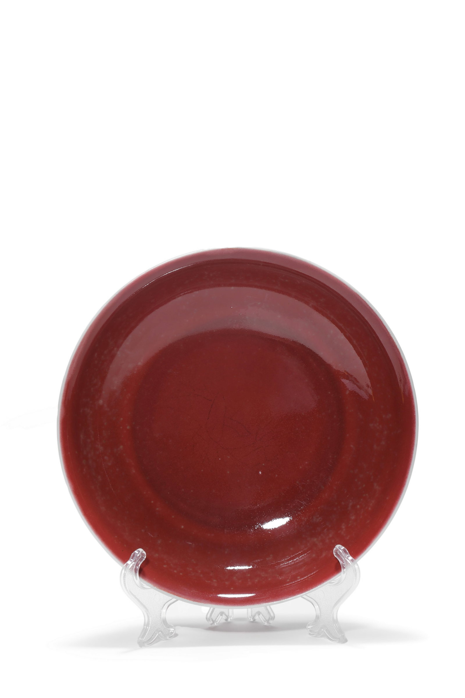 A Red Glaze Porcelain Plate, 18th C Pr.: Size:(Mouth Diameter 18cm) Shipping:EU\HK\USA Ondoor shipping estimation:85EUR Condition:(Good Condition except two chips on the mouth rim, slightly repaired.) Terms:(It is the Buyer's responsibility 