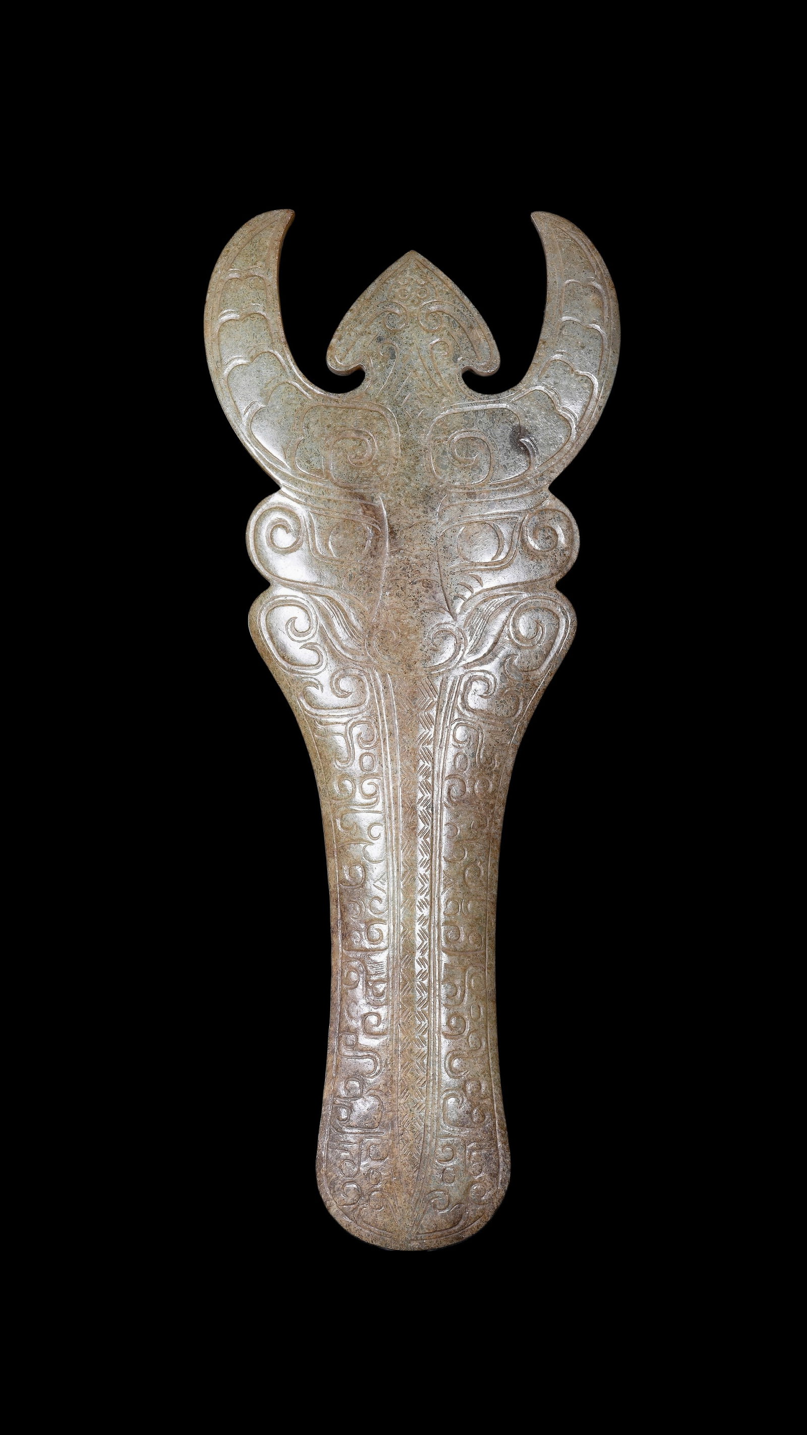 A Calcified Pale Jade Ox-Headed Plaque, Western Zhou, Circa 10th?C9th C BC Pr.: Size:(Height24cm Length 10cm) Shipping:EU\HK\USA Ondoor shipping estimation:75EUR Condition:(Good Condition, No Repairment Checked by UV&Strong Light, Age Traces) Terms:(It is the Buyer's responsibili