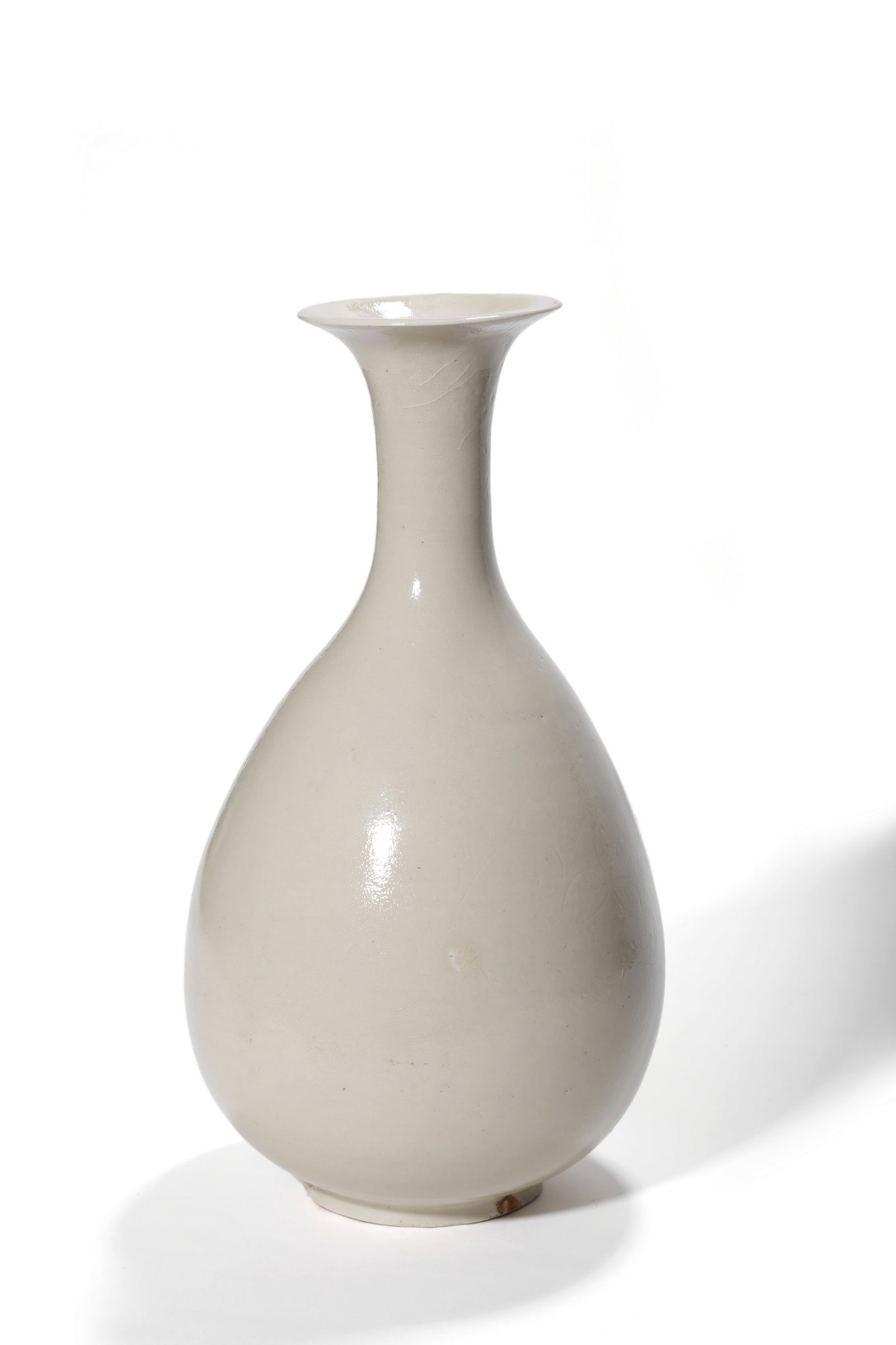A Ding Kiln White Glaze Yuhuchun Vase, 10th?C12th C Pr. (1 of 3)