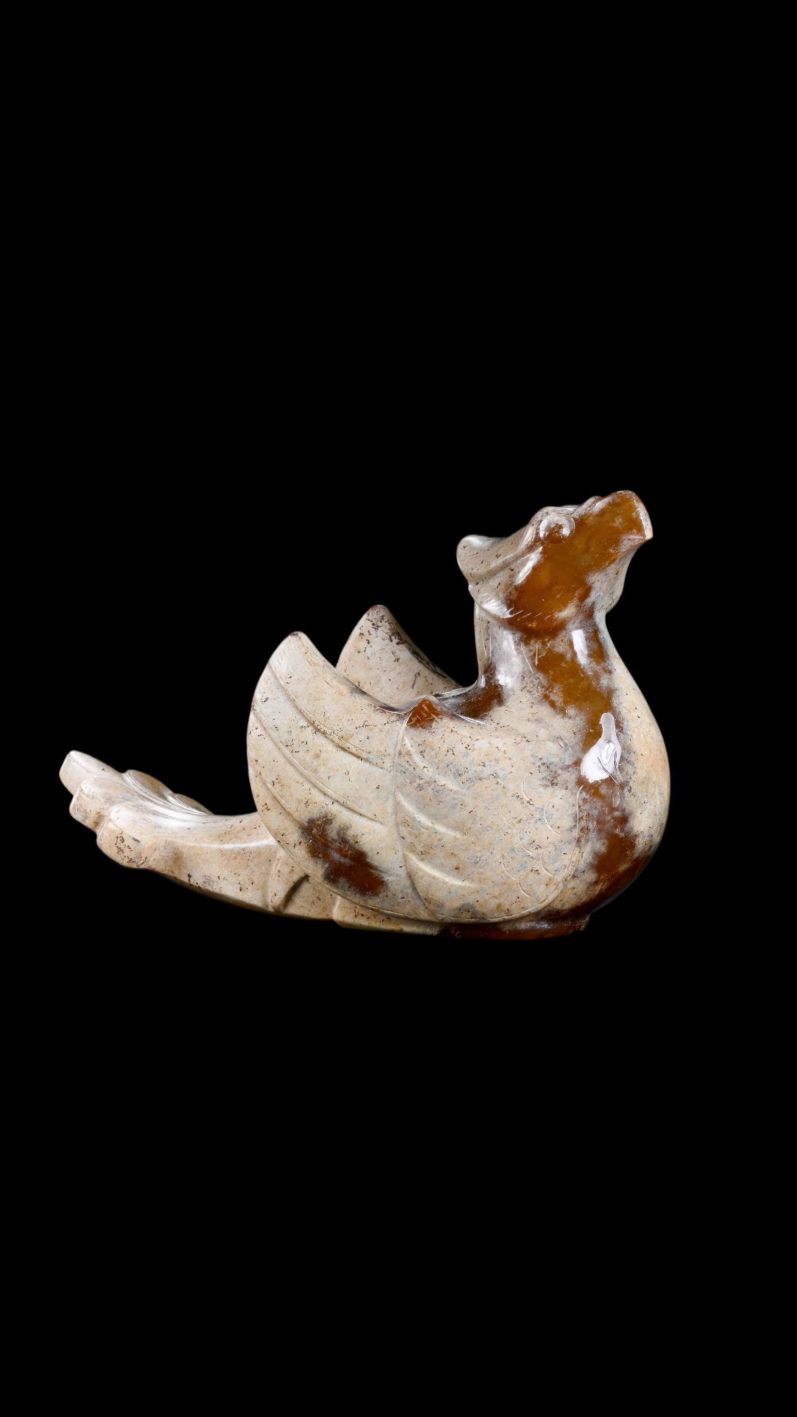 A Calcified White Jade Phoenix Carving with Russet Inclusions, Han, Circa 2nd C BC?C2nd C AD Pr.: Size:(Height6.5cm Length 10.5cm) Shipping:EU\HK\USA Ondoor shipping estimation:75EUR Condition:(Good Condition, No Repairment Checked by UV&Strong Light, Age Traces) Terms:(It is the Buyer's responsib