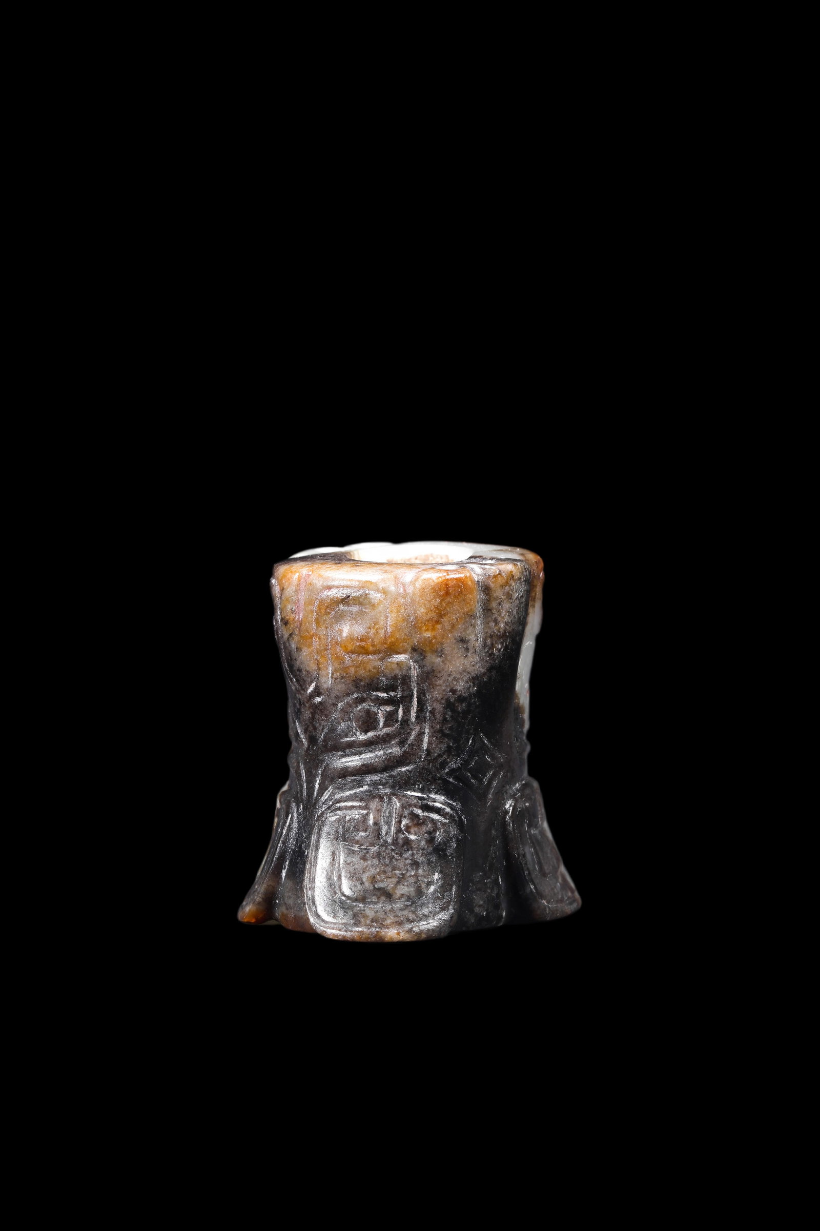 A Mottled Black & Brown Jade Flared Taotie Bead, Shang, Circa 13th?C11th C BC Pr.: Size:(Height3.6cm ) Shipping:EU\HK\USA Ondoor shipping estimation:75EUR Condition:(Good Condition, No Repairment Checked by UV&Strong Light, Age Traces) Terms:(It is the Buyer's responsibility to insp