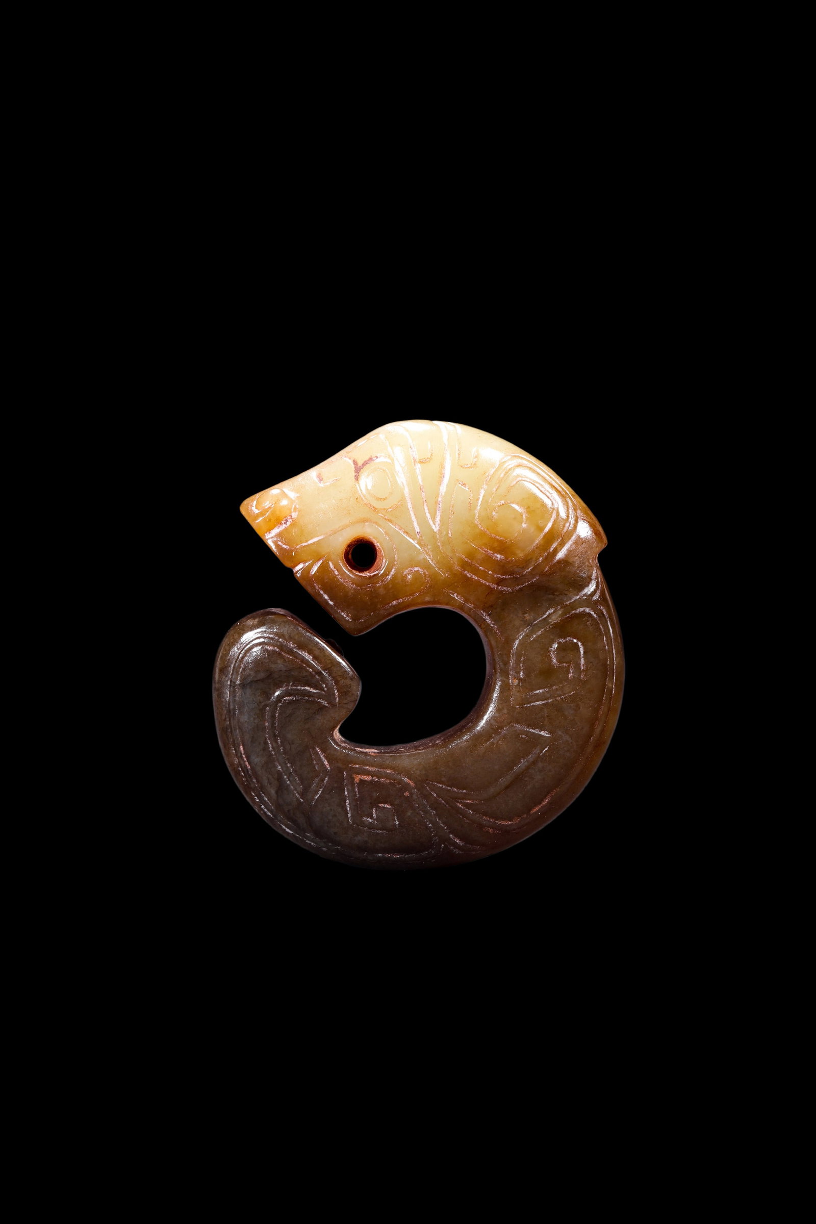 A Two-Tone Jade C-Shaped Dragon Pendant, Shang, Circa 13th?C11th C BC Pr.: Size:(Length 5cm ) Shipping:EU\HK\USA Ondoor shipping estimation:75EUR Condition:(Good Condition, No Repairment Checked by UV&Strong Light, Age Traces) Terms:(It is the Buyer's responsibility to inspe
