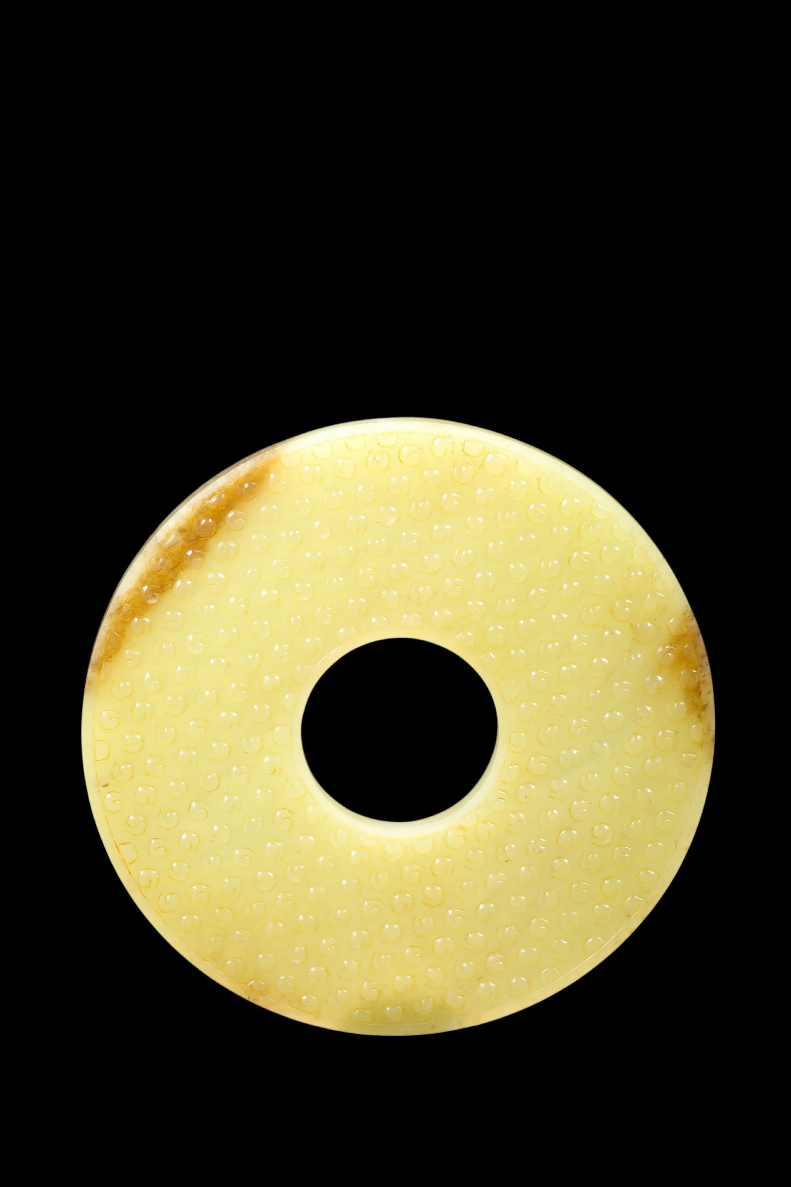 A Pale Yellow Jade Granule Bi Disc, Warring States, Circa 475?C221 BC Pr.: Size:(Width11.4cm ) Shipping:EU\HK\USA Ondoor shipping estimation:75EUR Condition:(Good Condition, No Repairment Checked by UV&Strong Light, Age Traces) Terms:(It is the Buyer's responsibility to insp