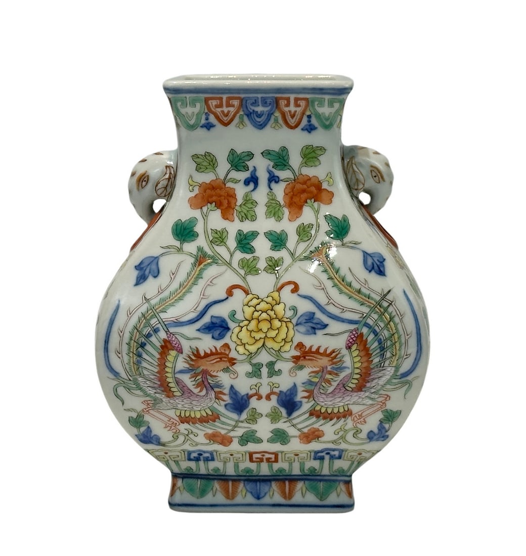 A Chinese Doucai elephant-eared vase, Qing Dynasty Pr.: Size:(Height16.3cm, Mouth Diameter7cm) Shipping:EU\HK\USA Ondoor shipping estimation:115EUR Condition:(Good Condition, No Hairlines, No Cracks, No Repairment Checked by UV&Strong Light, Age Traces) Te