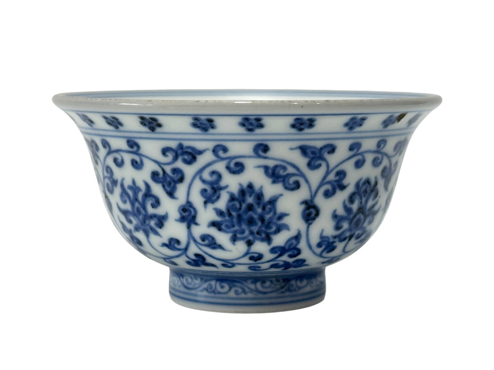 A Chinese blue-and-white cup with entwined lotus pattern, Ming Dynasty Pr.: Size:(Height5.3cm, Mouth Diameter9.8cm) Shipping:EU\HK\USA Ondoor shipping estimation:85EUR Condition:(Good Condition, No Hairlines, No Cracks, No Repairment Checked by UV&Strong Light, Age Traces) Te