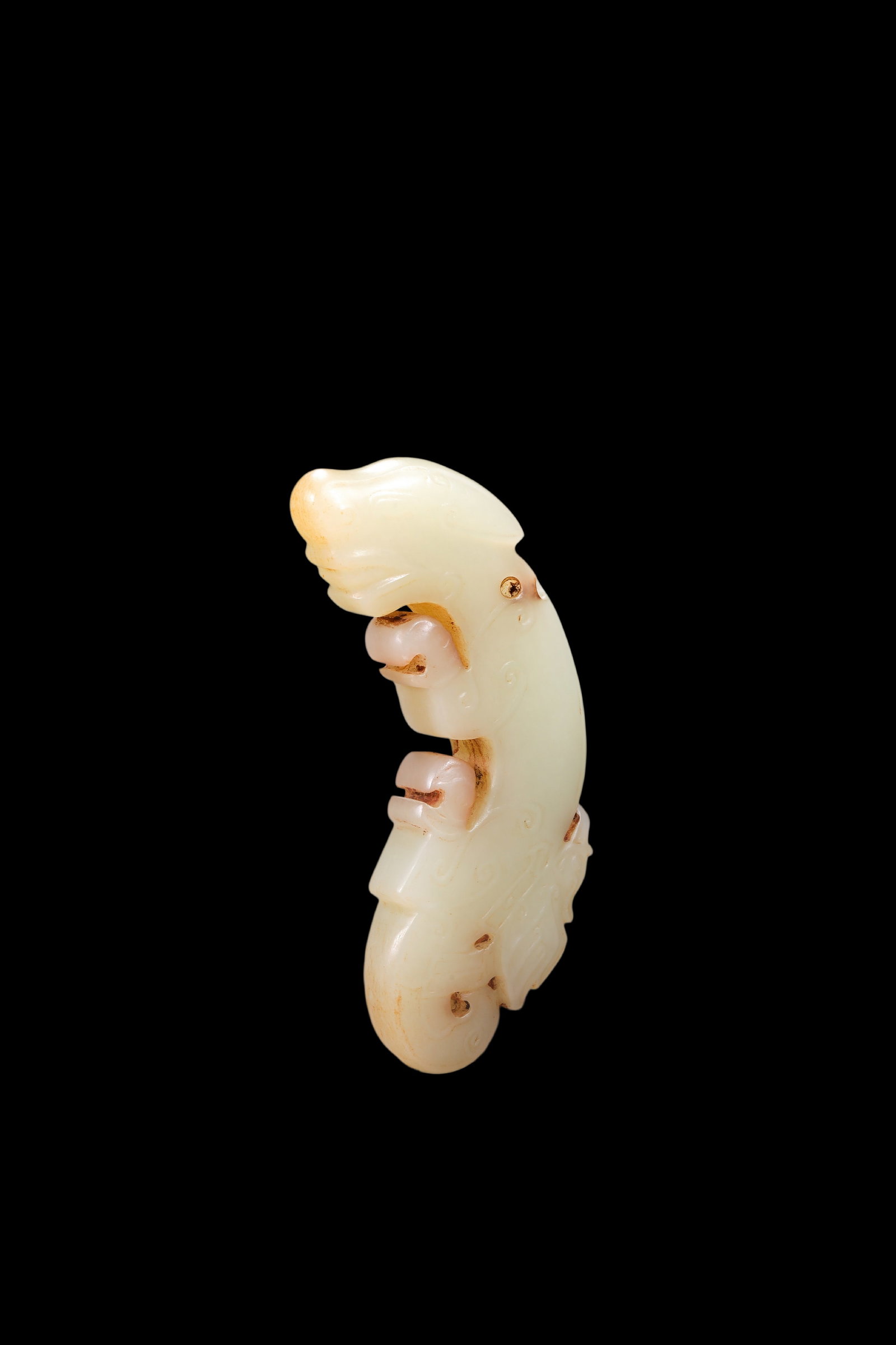 A Pale Jade C-Shaped Dragon Pendant with Russet Veins, Late Shang, Circa 12th?C11th C BC Pr.: Size:(Length 10cm ) Shipping:EU\HK\USA Ondoor shipping estimation:75EUR Condition:(Good Condition, No Repairment Checked by UV&Strong Light, Age Traces) Terms:(It is the Buyer's responsibility to insp