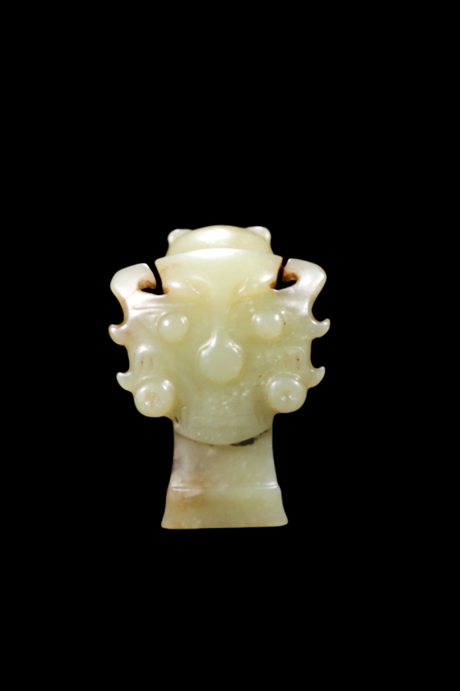 A Pale Yellow Jade Human Mask Pendant, Shang, Circa 13th?C11th C BC Pr.: Size:(Length 5.5cm ) Shipping:EU\HK\USA Ondoor shipping estimation:75EUR Condition:(Good Condition, No Repairment Checked by UV&Strong Light, Age Traces) Terms:(It is the Buyer's responsibility to ins