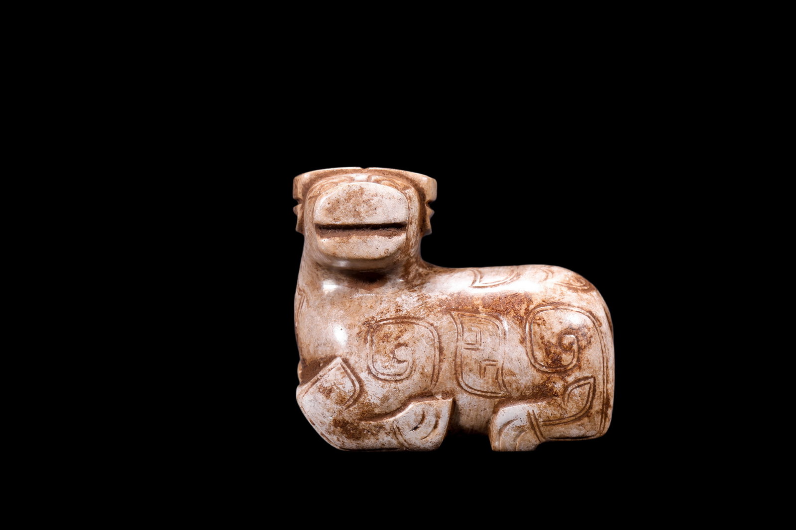A Calcified Pale Jade Recumbent Ox Carving, Shang, Circa 13th?C11th C BC Pr.: Size:(Length 6.6cm ) Shipping:EU\HK\USA Ondoor shipping estimation:75EUR Condition:(Good Condition, No Repairment Checked by UV&Strong Light, Age Traces) Terms:(It is the Buyer's responsibility to ins