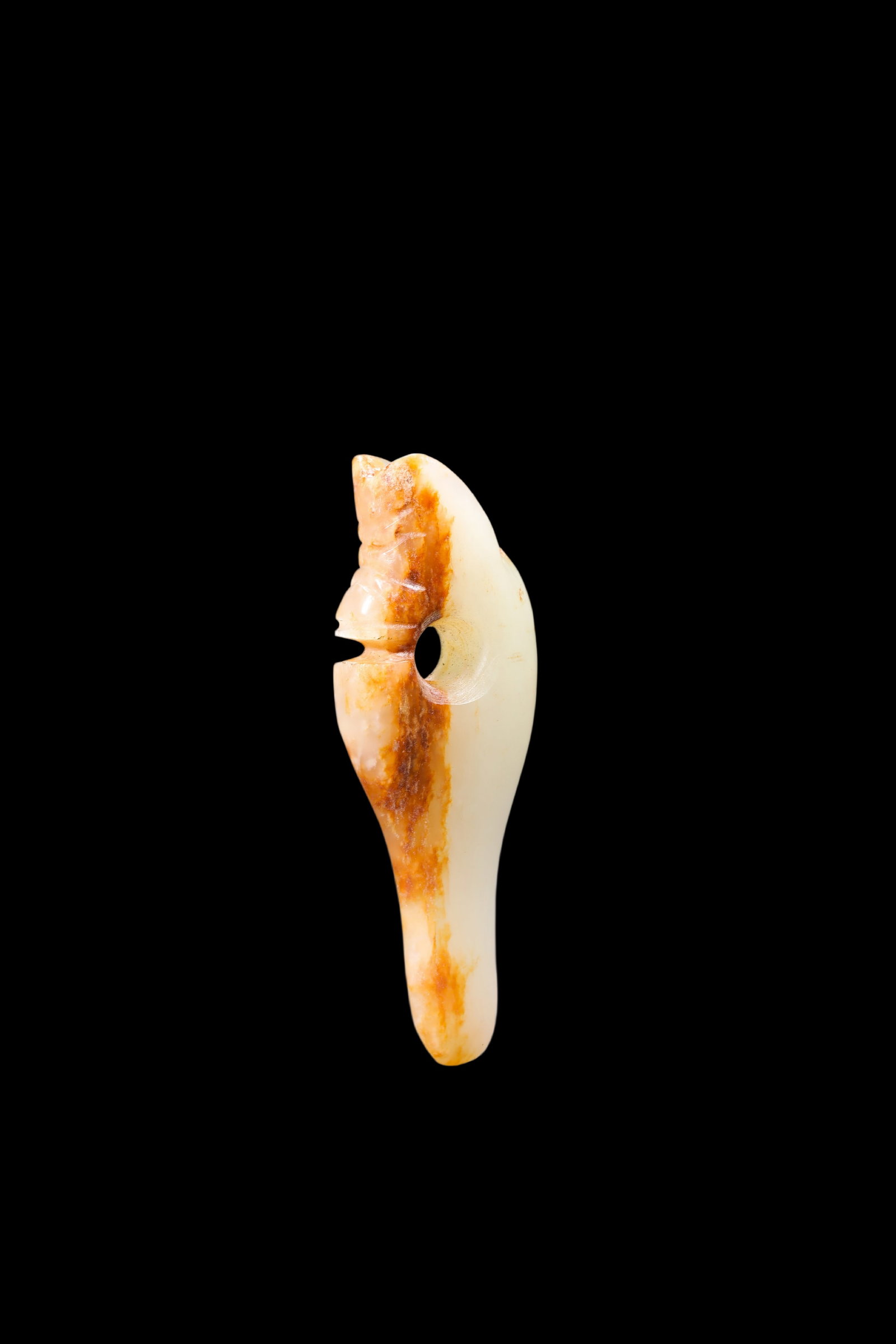 A Pale Jade Dragon Tooth Pendant with Russet Inclusions, Shang, Circa 13th?C11th C BC Pr.: Size:(Length 5.6cm ) Shipping:EU\HK\USA Ondoor shipping estimation:75EUR Condition:(Good Condition, No Repairment Checked by UV&Strong Light, Age Traces) Terms:(It is the Buyer's responsibility to ins