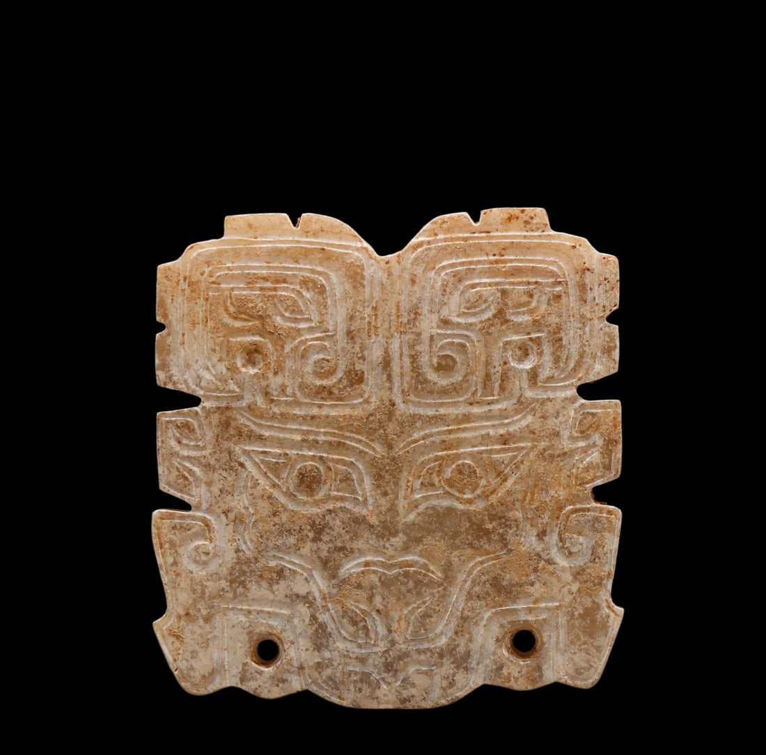 A Calcified Brown Jade Taotie Mask Pendant, Western Zhou, Circa 10th?C9th C BC Pr.: Size:(Height4.5cm, Width4.2cm) Shipping:EU\HK\USA Ondoor shipping estimation:75EUR Terms:(It is the Buyer's responsibility to inspect each lot and deem their own opinions on Condition, Description, Pr