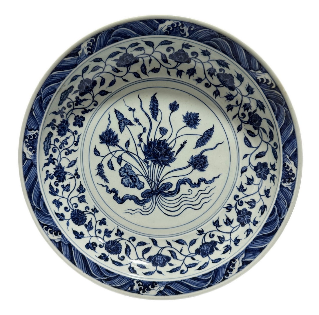 A Chinese blue-and-white plater decorated with entwined floral flowers, Ming Dynasty Pr.: Size:(Height7cm, Mouth Diameter42.2cm) Shipping:EU\HK\USA Ondoor shipping estimation:115EUR Condition:(Good Condition except Hairlines, No Cracks, No Repairment Checked by UV&Strong Light, Age Traces)