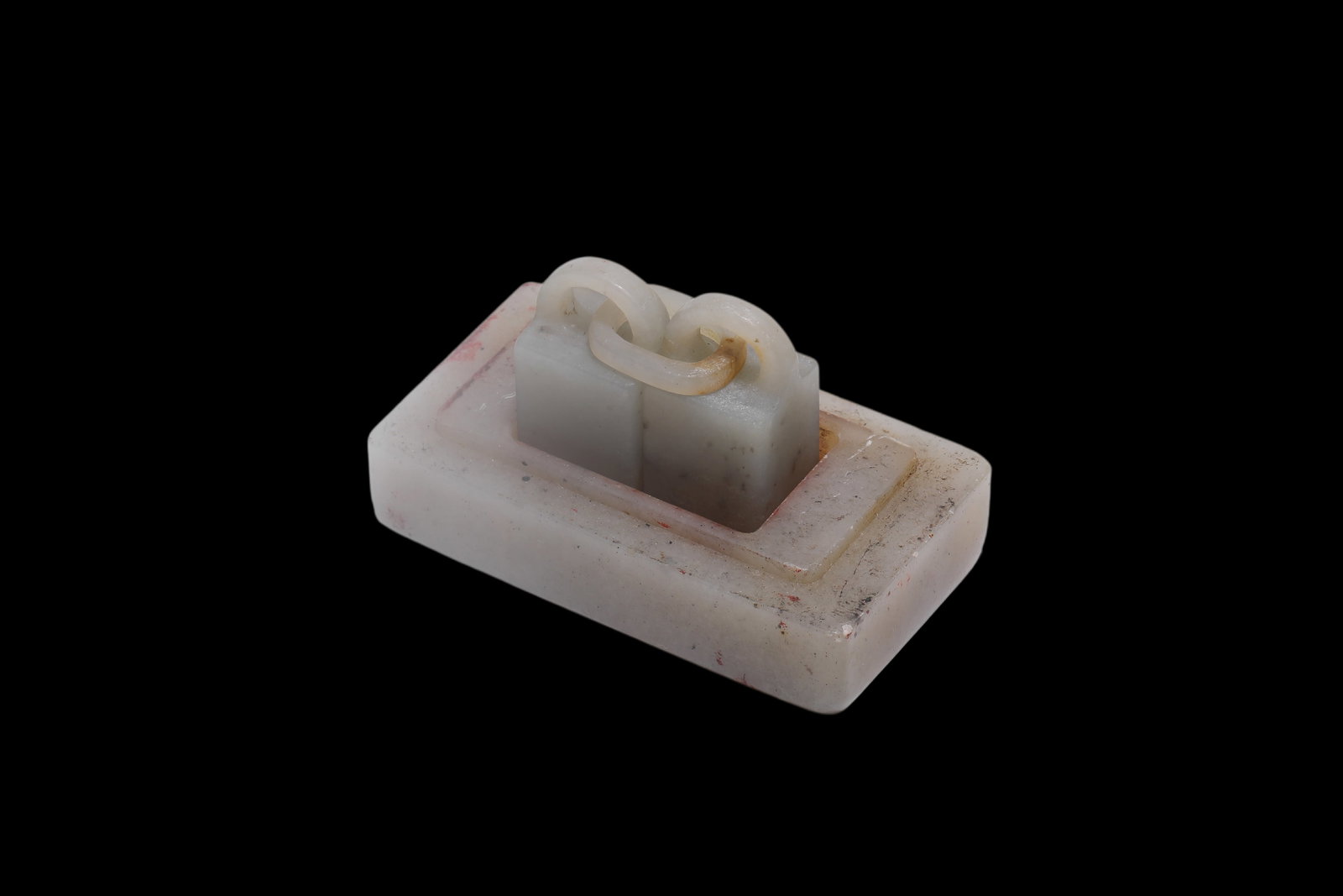 A Chinese Ancient jade interlinked double?seal with base, 2nd century B.C?2nd century A.D Pr. (1 of 3)