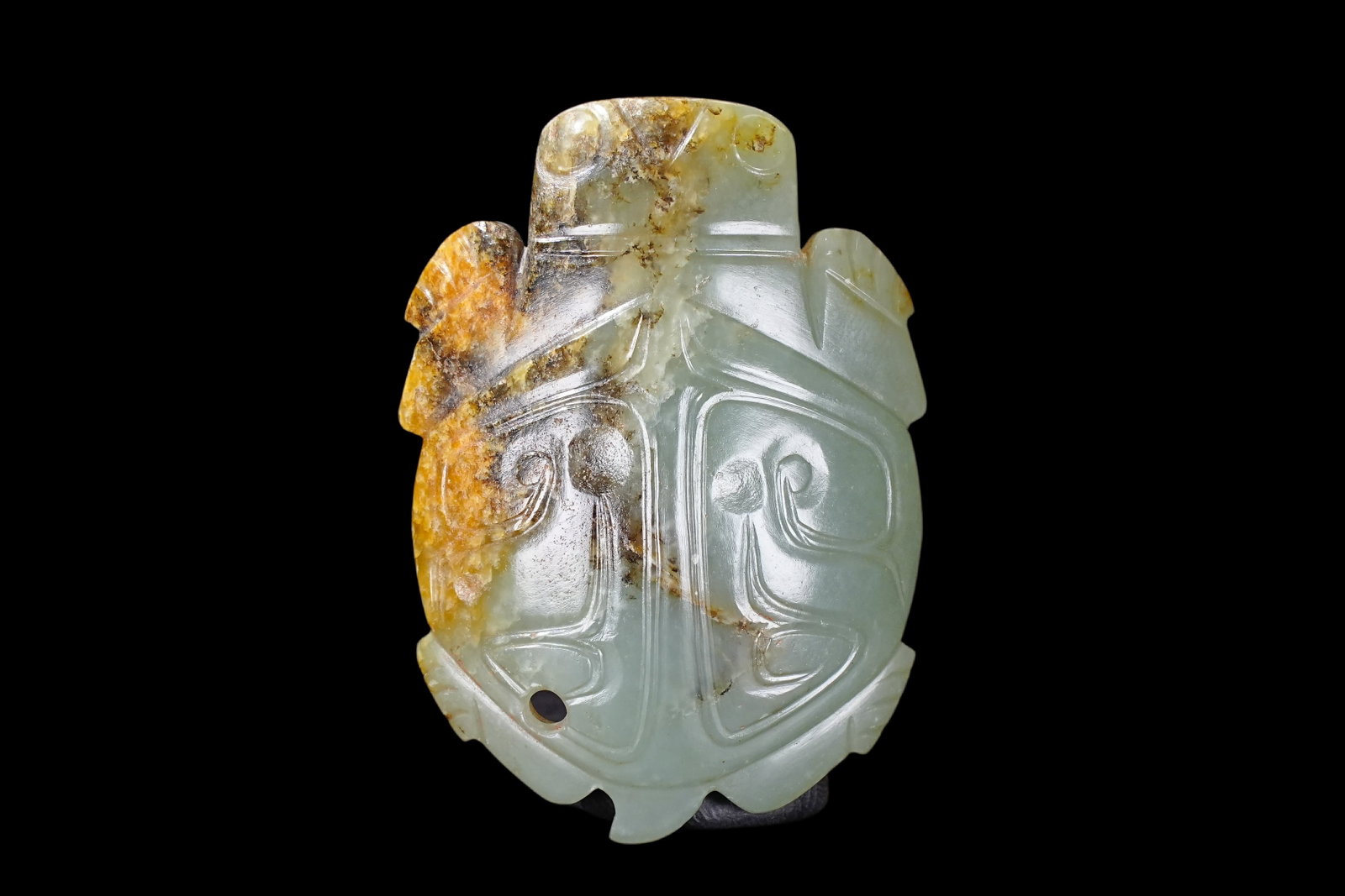 A Chinese jade ornament, 12th Pr.: Size:(Length5.1cm, Width3.65, Depth1cm) Shipping:EU\HK\USA Ondoor shipping estimation:70EUR Condition:(Good Condition, No Repairment Checked by UV&Strong Light, Age Traces) Terms:(It is the Buyer's re