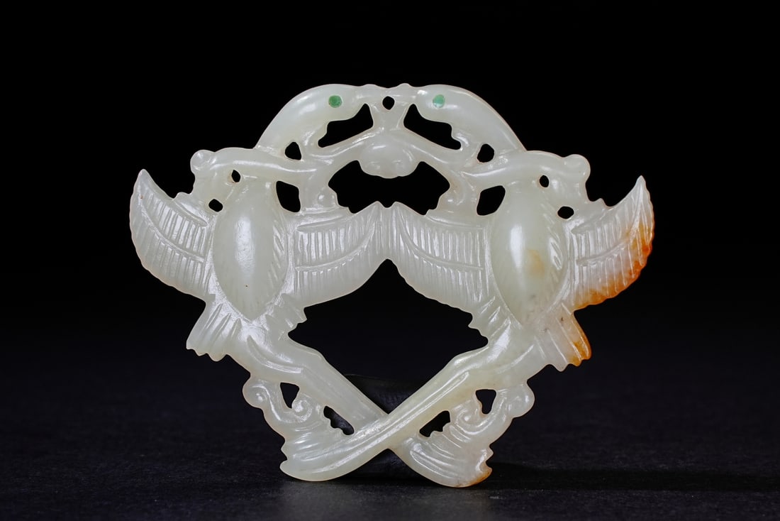 A Chinese jade ornament, 12th Pr.: Size:(Length5.8cm, Width4.3, Depth0.5cm) Shipping:EU\HK\USA Ondoor shipping estimation:70EUR Condition:(Good Condition, No Repairment Checked by UV&Strong Light, Age Traces) Terms:(It is the Buyer's r