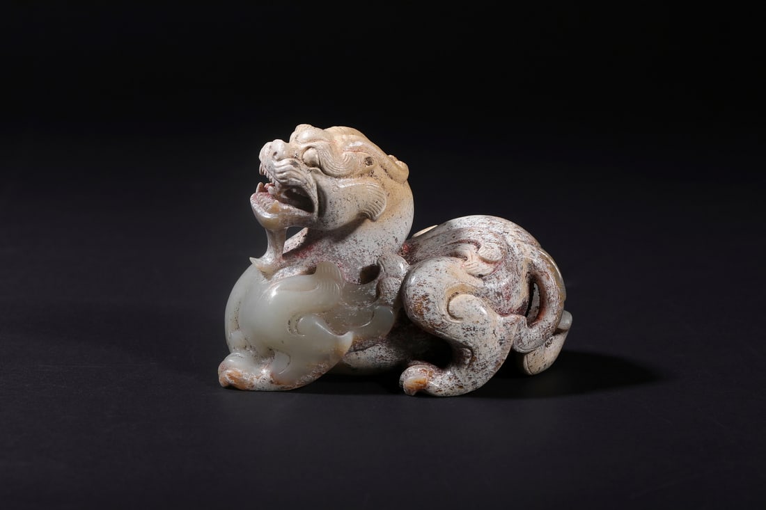 A Chinese Ancient Carved Jade Bixie Figure, 3rd?Century?BCE?1st?Century?BCE Pr.: Size:(Length10cm) Shipping:EU\HK\USA Ondoor shipping estimation:70EUR Condition:(Good Condition, No Repairment Checked by UV&Strong Light, Age Traces) Terms:(It is the Buyer's responsibility to inspec