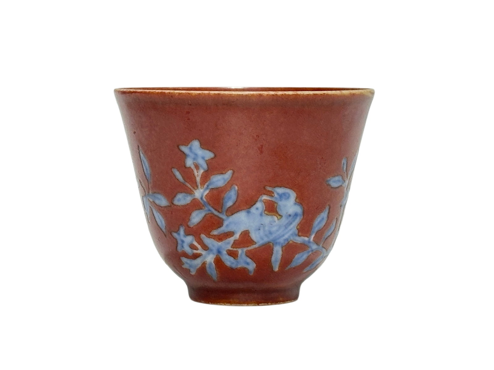 A Chinese cooper red ground with blue-and-white floral and bird pattern cup, Ming Dynasty Pr.: Size:(Height4.8cm, Mouth Diameter6cm) Shipping:EU\HK\USA Ondoor shipping estimation:75EUR Condition:(Good Condition, No Hairlines, No Cracks, No Repairment Checked by UV&Strong Light, Age Traces) Term