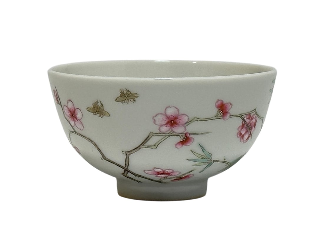 A Chinese Famille rose cup with plum blossom decoration, unkown mark.: Size:(Height4cm, Mouth Diameter6.8cm) Shipping:EU\HK\USA Ondoor shipping estimation:75EUR Condition:(Good Condition, No Hairlines, No Cracks, No Repairment Checked by UV&Strong Light, Age Traces) Term