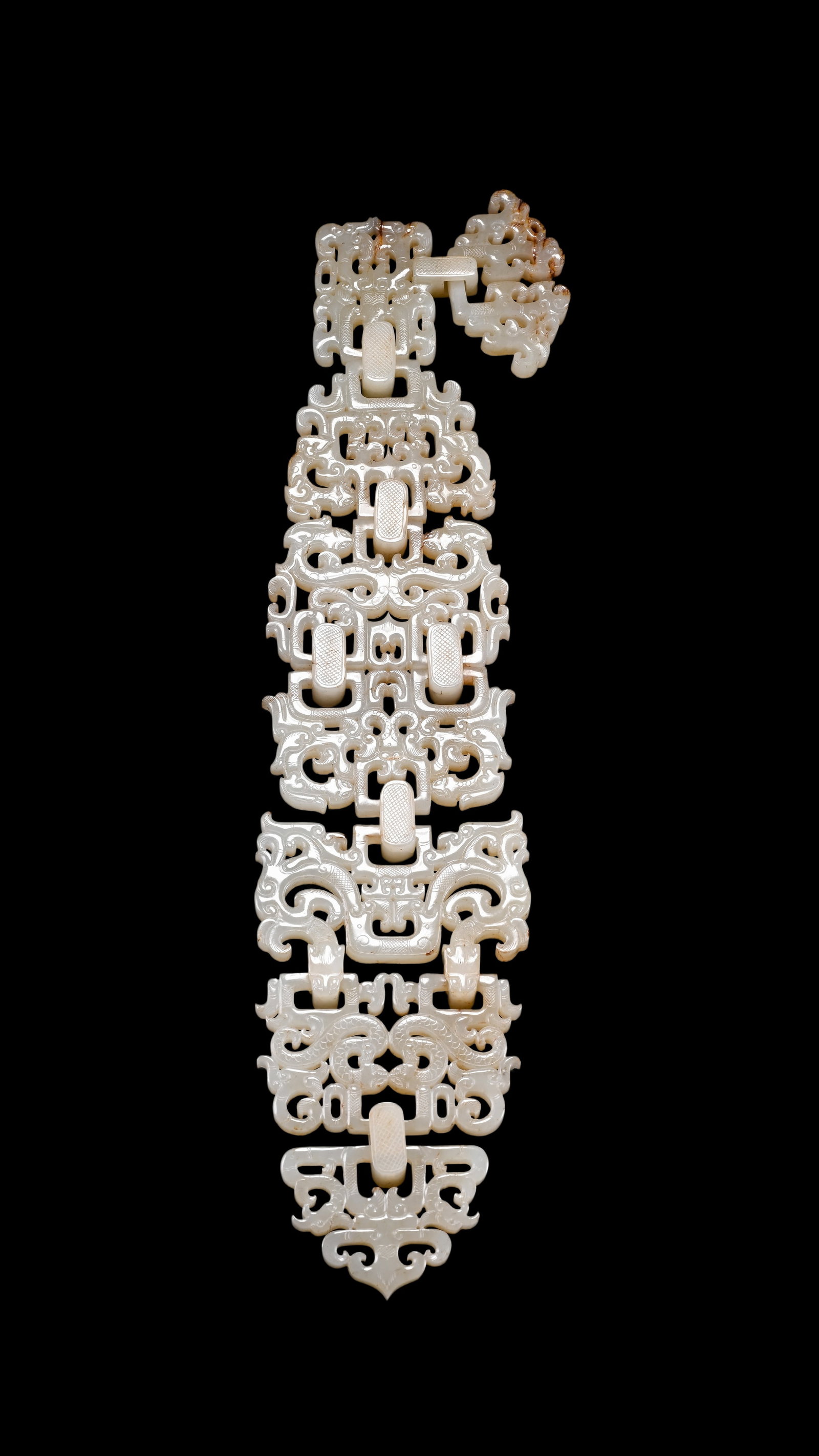 An Elaborate Openwork White Jade Interlinked Multi?Segment Belt Ornament with Dragon Motifs, 2nd: Size:(Length32cm Width8cm) Shipping:EU\HK\USA Ondoor shipping estimation:70EUR Condition:(Good Condition, No Repairment Checked by UV&Strong Light, Age Traces) Terms:(It is the Buyer's responsibility