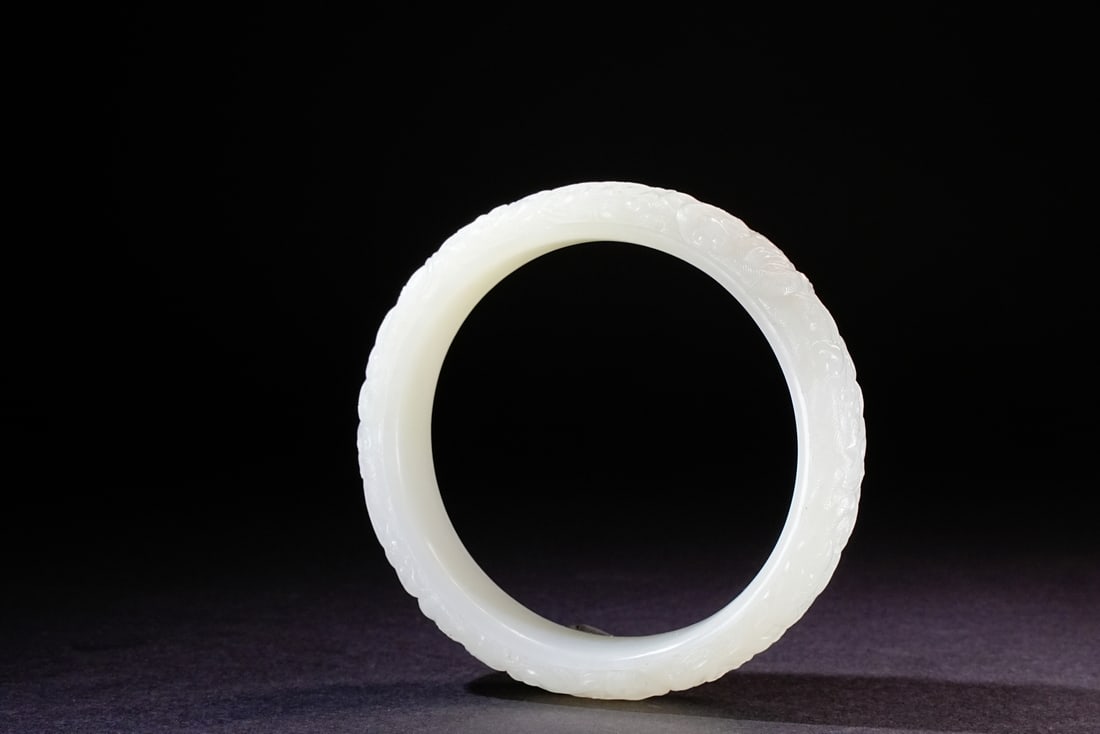 A Chinese jade ornament, 12th Pr. (1 of 7)