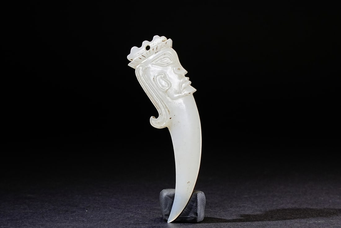 A Chinese jade ornament, 12th Pr.: Size:(Length6.4cm, Width2, Depth0.52cm) Shipping:EU\HK\USA Ondoor shipping estimation:70EUR Condition:(Good Condition, No Repairment Checked by UV&Strong Light, Age Traces) Terms:(It is the Buyer's re