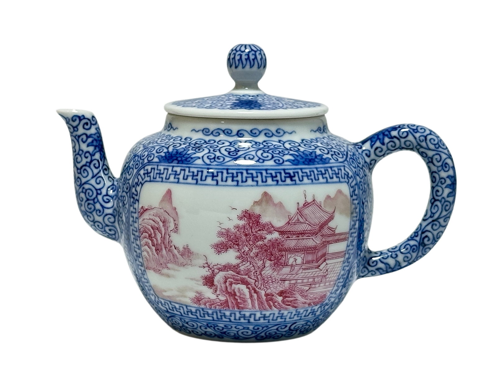 A Chinese rouge-red teapot with landscape scene, marked, Qing Dynasty Pr.: Size:(Height11cm, Mouth Diameter6cm) Shipping:EU\HK\USA Ondoor shipping estimation:115EUR Condition:(Good Condition, No Hairlines, No Cracks, No Repairment Checked by UV&Strong Light, Age Traces) Term