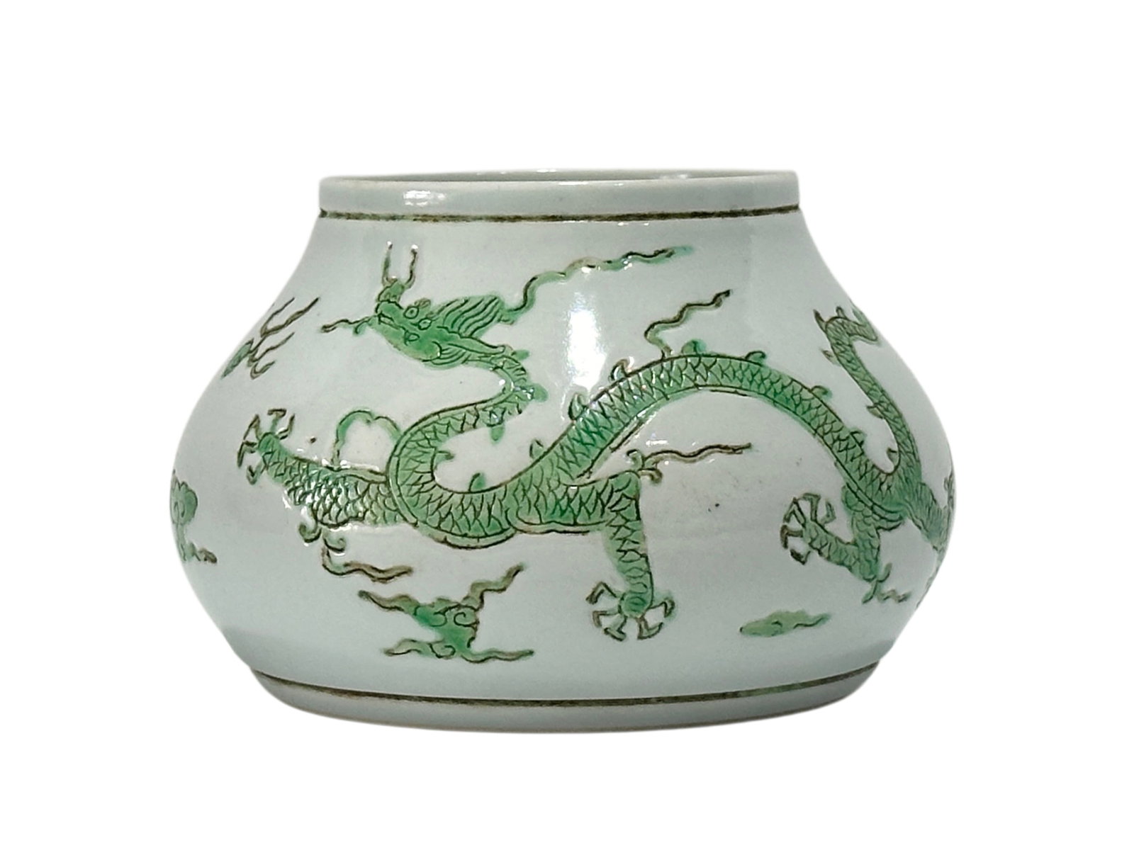 A Chinese green dragon-patterned water pot with encarved pattern, Ming Dynasty Pr.: Size:(Height8cm, Mouth Diameter7.3cm) Shipping:EU\HK\USA Ondoor shipping estimation:95EUR Condition:(Good Condition, No Hairlines, No Cracks, No Repairment Checked by UV&Strong Light, Age Traces) Term
