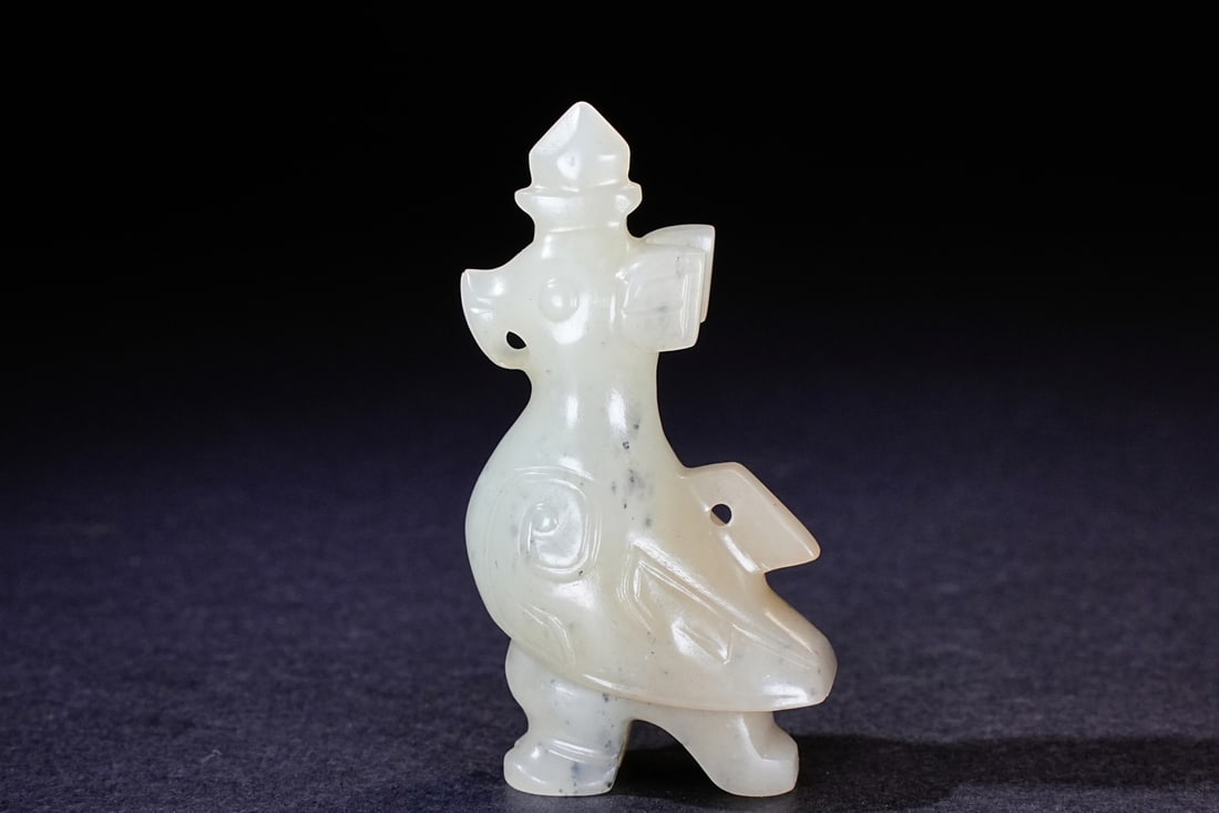 A Chinese jade ornament, 12th Pr.: Size:(Length3cm, Width1.8cm, Height5.4cm) Shipping:EU\HK\USA Ondoor shipping estimation:70EUR Condition:(Good Condition, No Repairment Checked by UV&Strong Light, Age Traces) Terms:(It is the Buyer's 