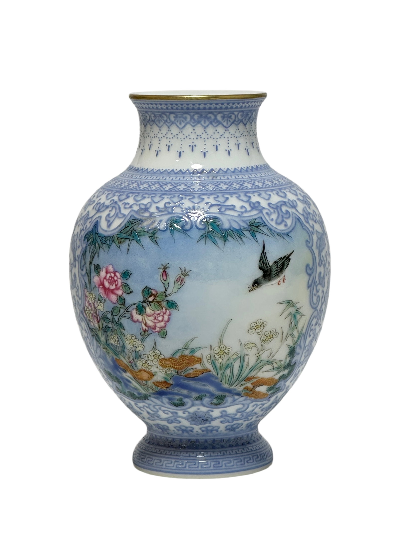 A Chinese Blue ground Famille Rose vase with entwined floral patterns, Qian Long Pr.: Size:(Height11.2cm, Mouth Diameter4.2cm) Shipping:EU\HK\USA Ondoor shipping estimation:105EUR Condition:(Good Condition, No Hairlines, No Cracks, No Repairment Checked by UV&Strong Light, Age Traces) 